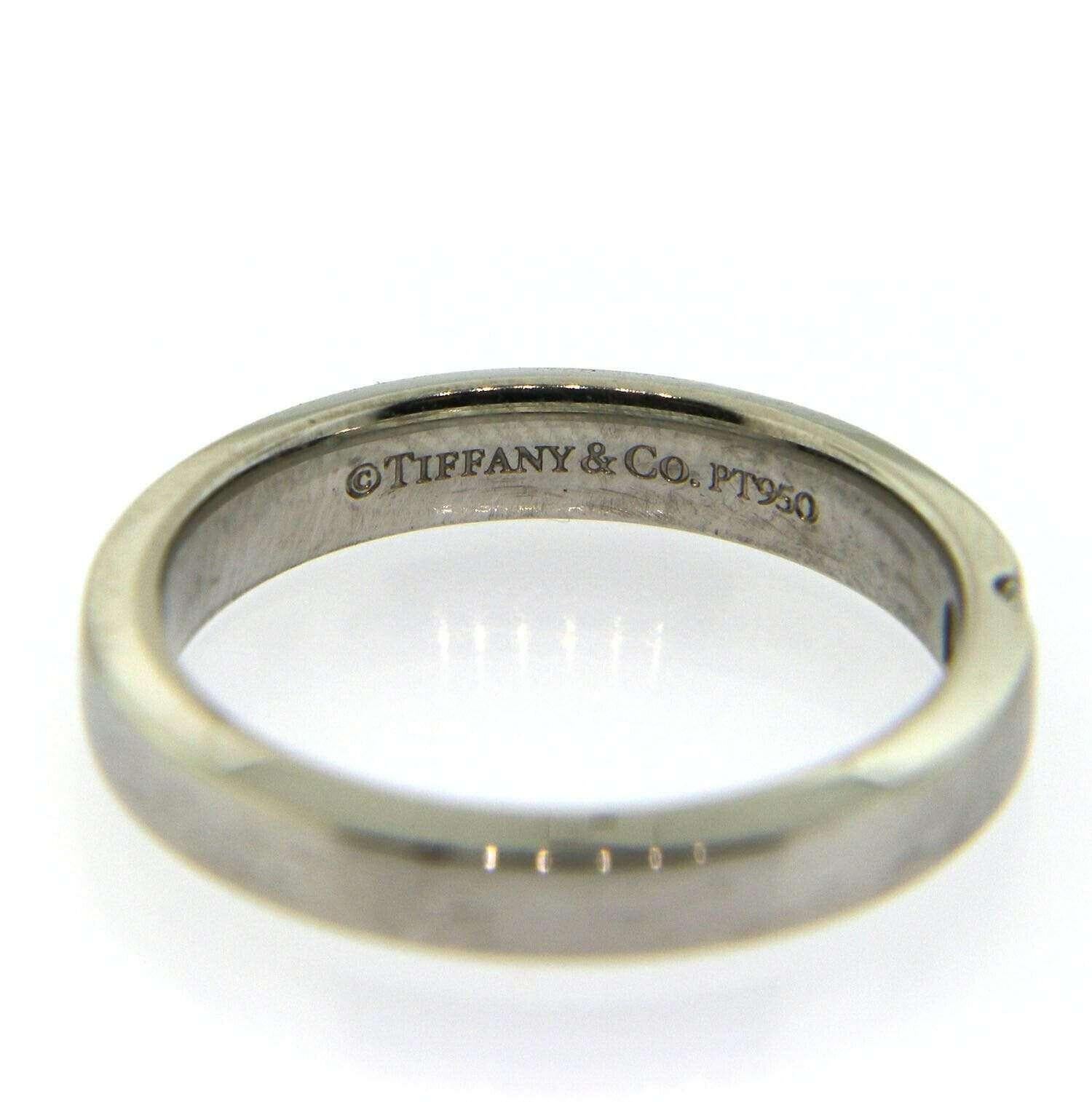 Tiffany & Co Diamond & Platinum Band

Diamond Band
Platinum
Diamond Weight: approx. 0.05 CT
Ring Size: 4.5 (US)
Ring Width: approx. 3.0 MM
Weight: approx. 5.0 Grams
Stamped: © Tiffany & Co, PT950
Condition:

Offered for your consideration is a