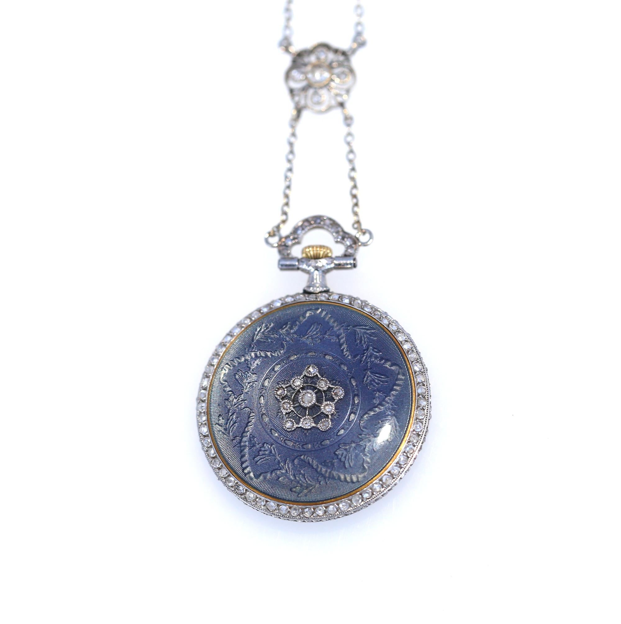 Tiffany & Co Blue Enamel Watch with Diamond on a lavalier chain with blue Enamel links. France. 1905.
Immaculate watch pendant with matte silvered dial signed TIFFANY & Co FRANCE and black Arabic numerals.
Amazing thing is that it was worn with a