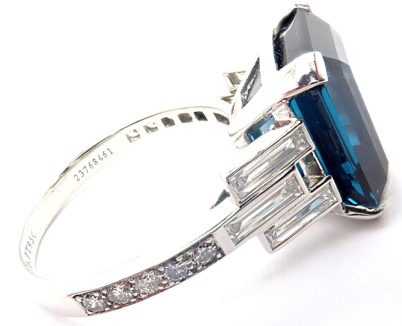 Platinum Diamond & Blue Tourmaline Legacy Ring by Tiffany &Co. 
With 6 Horizontal baguettes VS1 clarity, G color total weight .72ct
10 round brilliant cut diamonds VS1 clarity, G color total weight .24ct
One emerald cut large blue tourmaline total