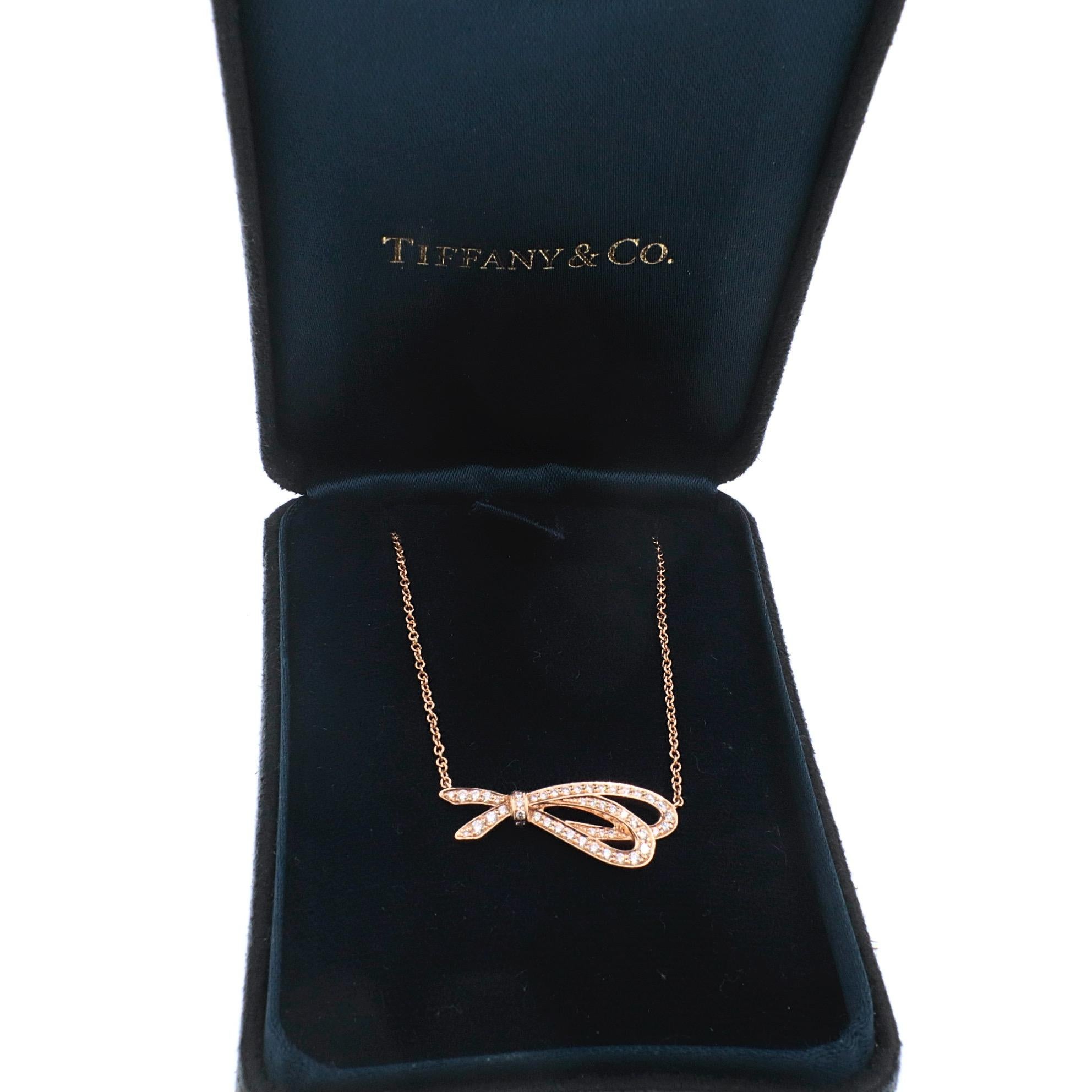 Tiffany & Co. Diamond Bow Pendant Necklace 18 Karat Rose Gold In Excellent Condition For Sale In San Diego, CA