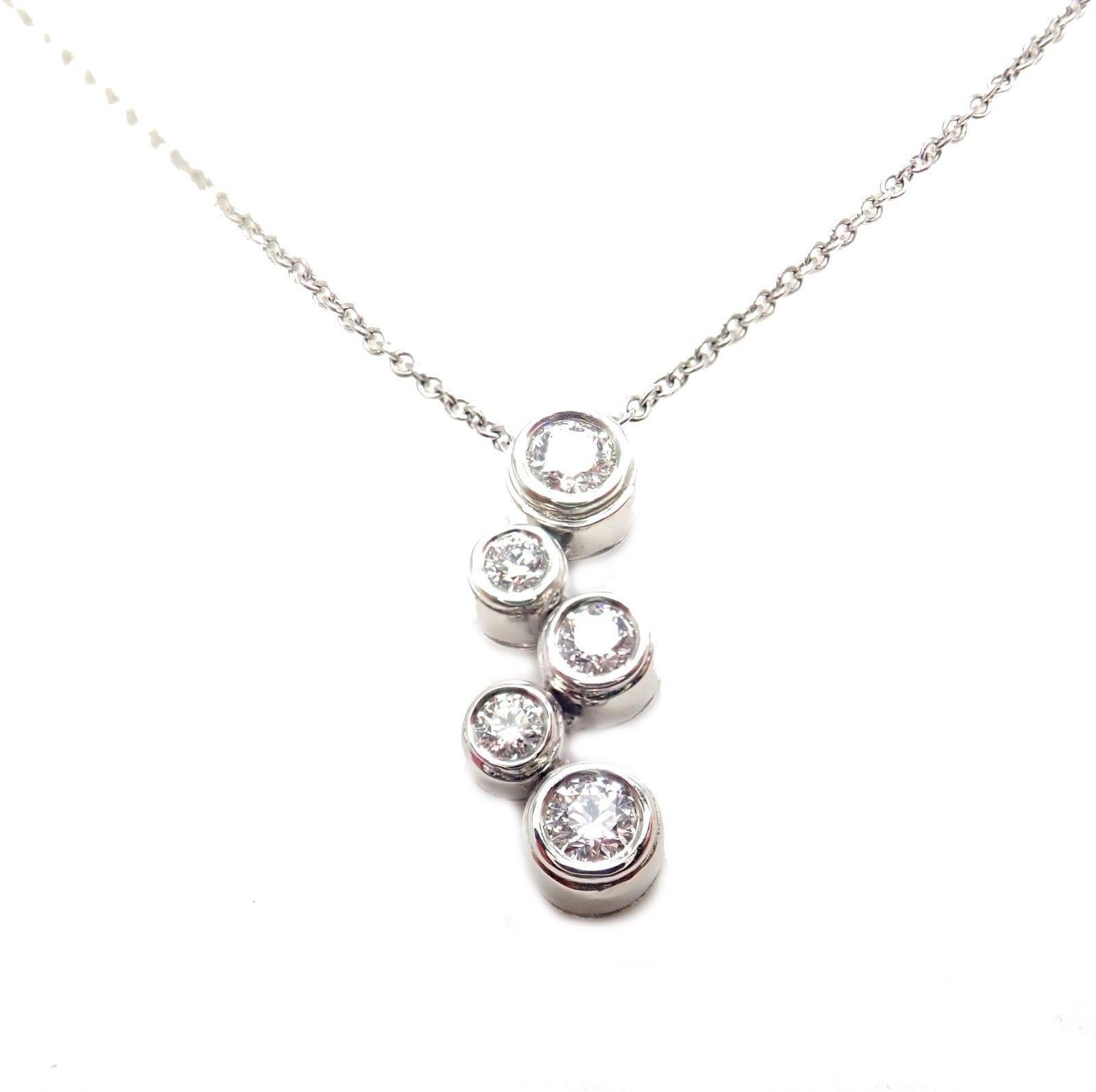 Platinum Diamond Bubbles Pendant Necklace by Tiffany & Co. 
With 5x diamonds VS1 clarity, G color total weight approx. .50ctw
This necklace comes with Tiffany & Co box and a pouch.
Details: 
Measurements: Chain Length: 16