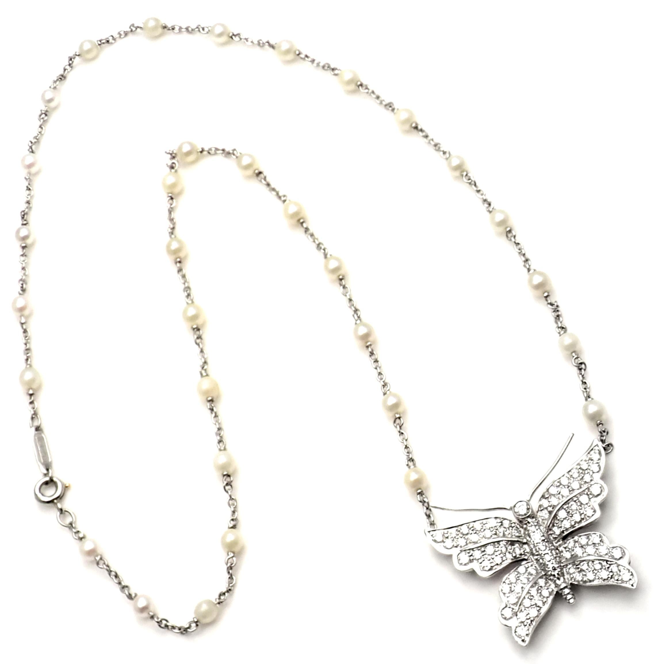 Platinum Diamond Butterfly Pearl Pendant Necklace by Tiffany & Co. 
90 Round brilliant cut diamonds VS1 clarity, G color total weight approx. 1.80ct 
32 pearls 3.5mm each
Details:
Length 18.5