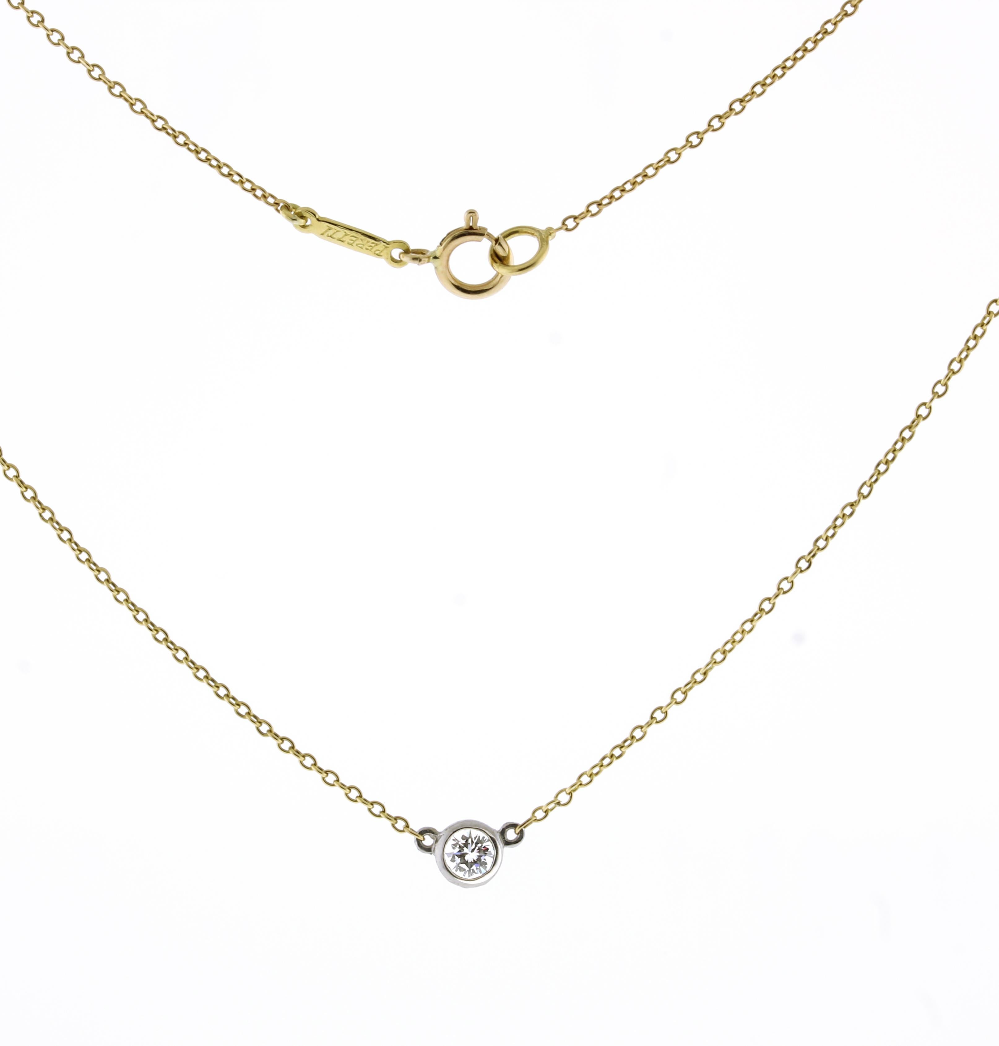 From Tiffany & Co's acclaimed designer Elsa Peretti diamond by the yard collection and diamond pendent.
Designer: Tiffany & Co.
♦ Metal: 18 Karat gold, platinum bezel
♦ Diamond=..14 carats G-H color, VS clarity, 
♦ Circa 1999
♦ 16 inch necklace
♦