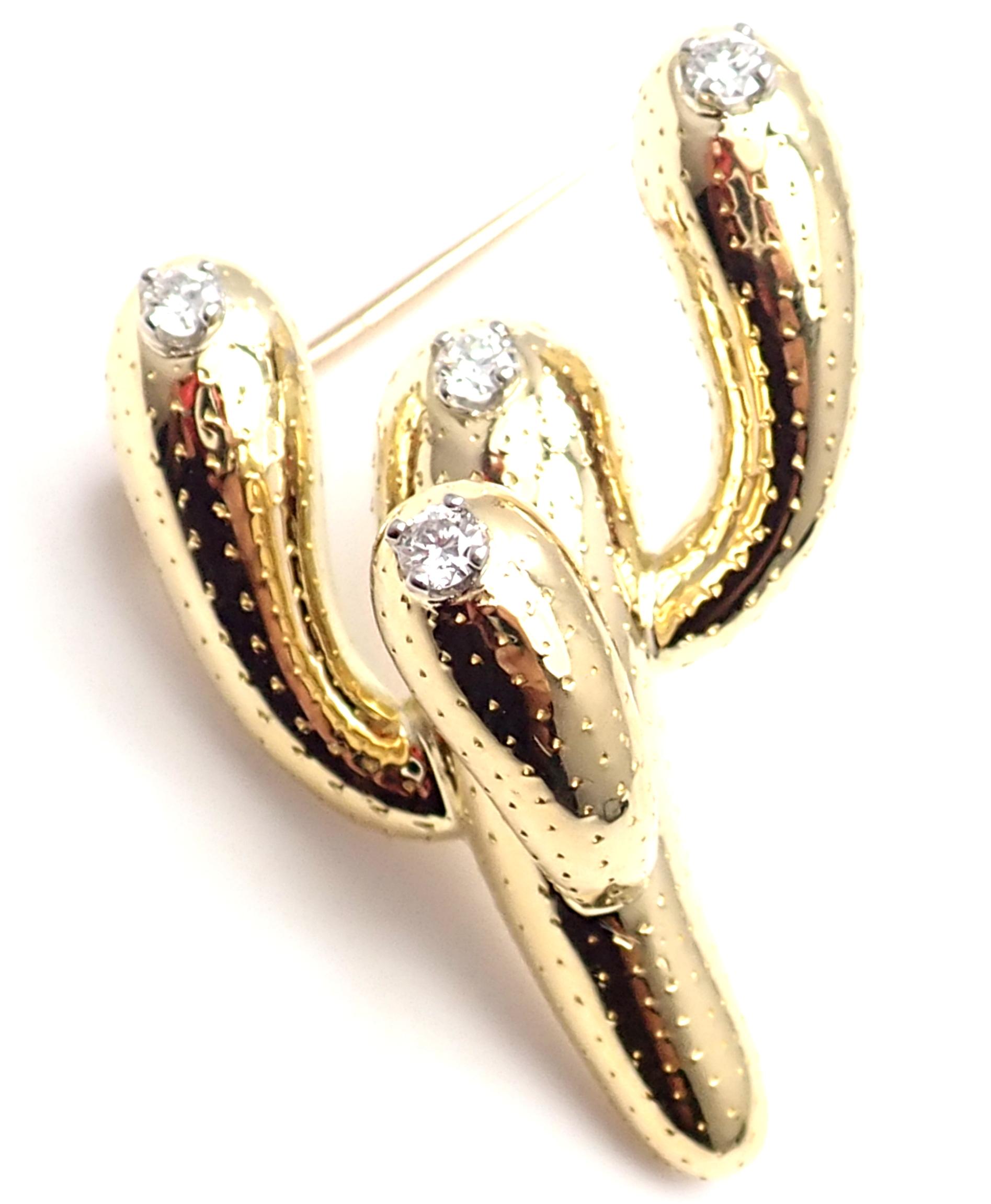 18k Yellow Gold And Platinum Diamond Cactus Plant Brooch Pins by Tiffany & Co. 
With 4 round brilliant cut diamonds VS1 clarity, G color total weight approx. .24ct
Details: 
Measurements: 36mm x 25mm
Weight:  8.3 grams
Stamped Hallmarks: Tiffany &