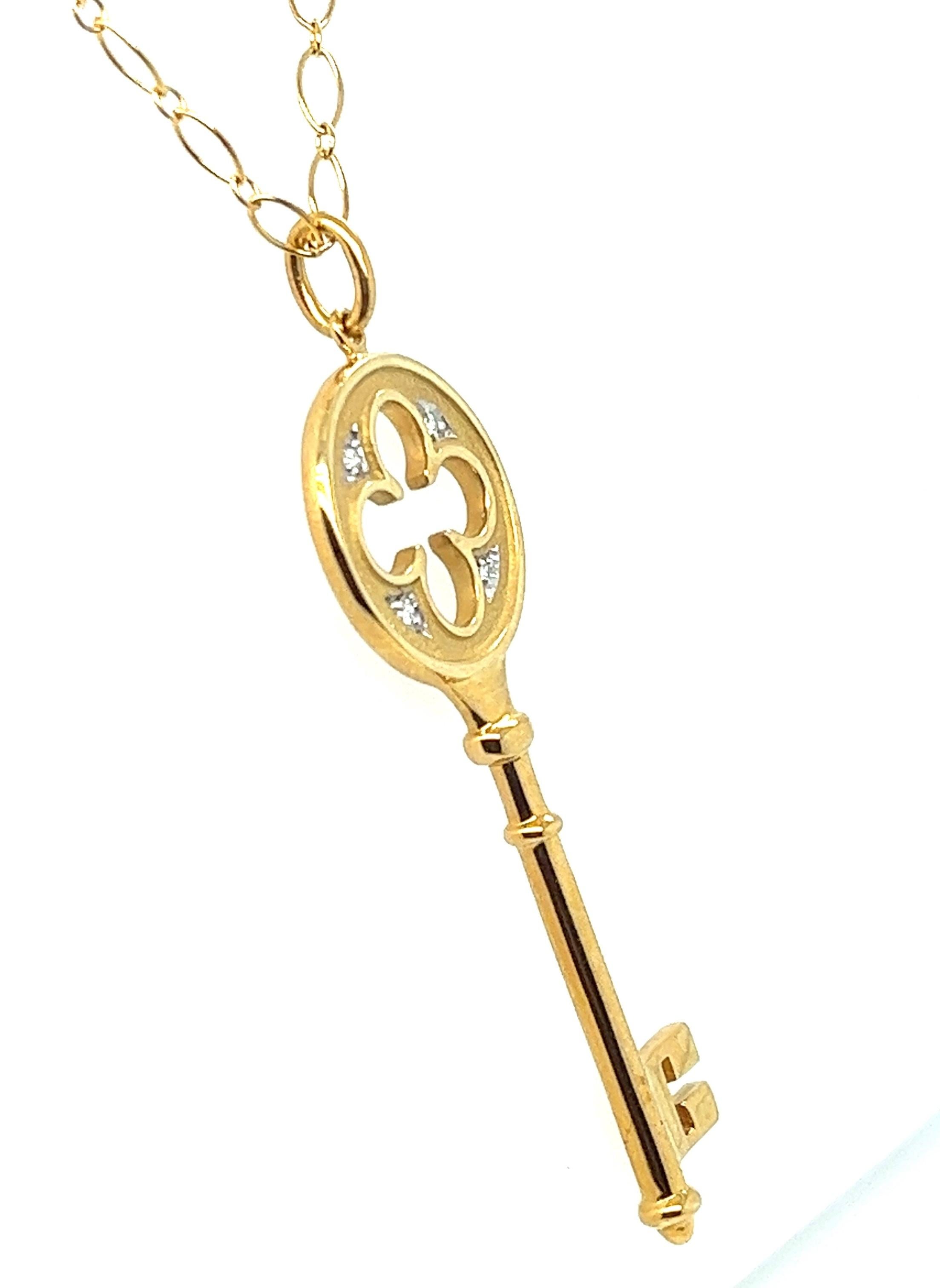 Contemporary Tiffany & Co. Diamond Clover Leaf Key Pendant in 18kt Yellow Gold , Box incl. For Sale
