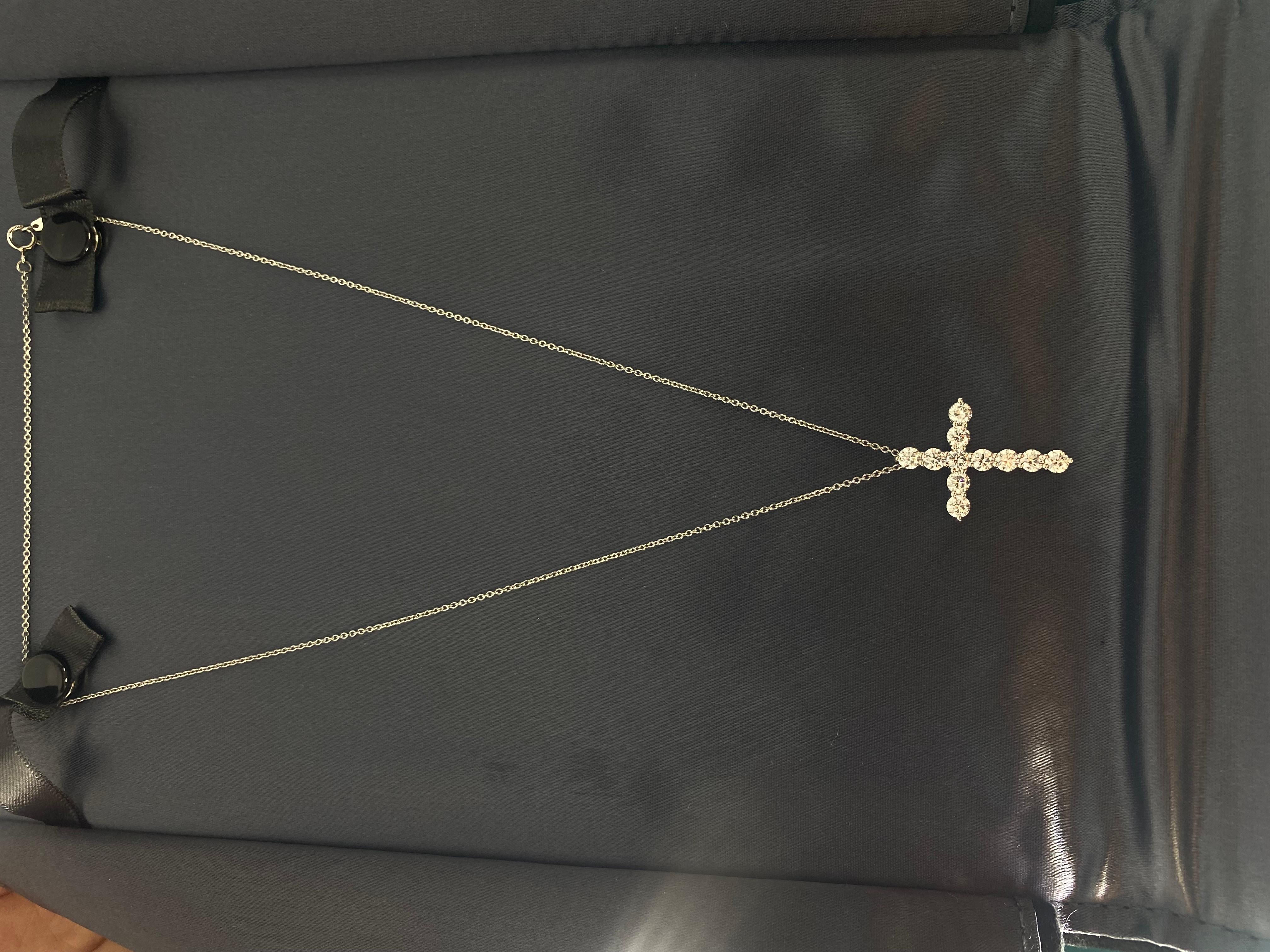 Tiffany Co Diamond cross 
Size large 
Pendant in platinum with round brilliant diamonds. Size large, on a 16