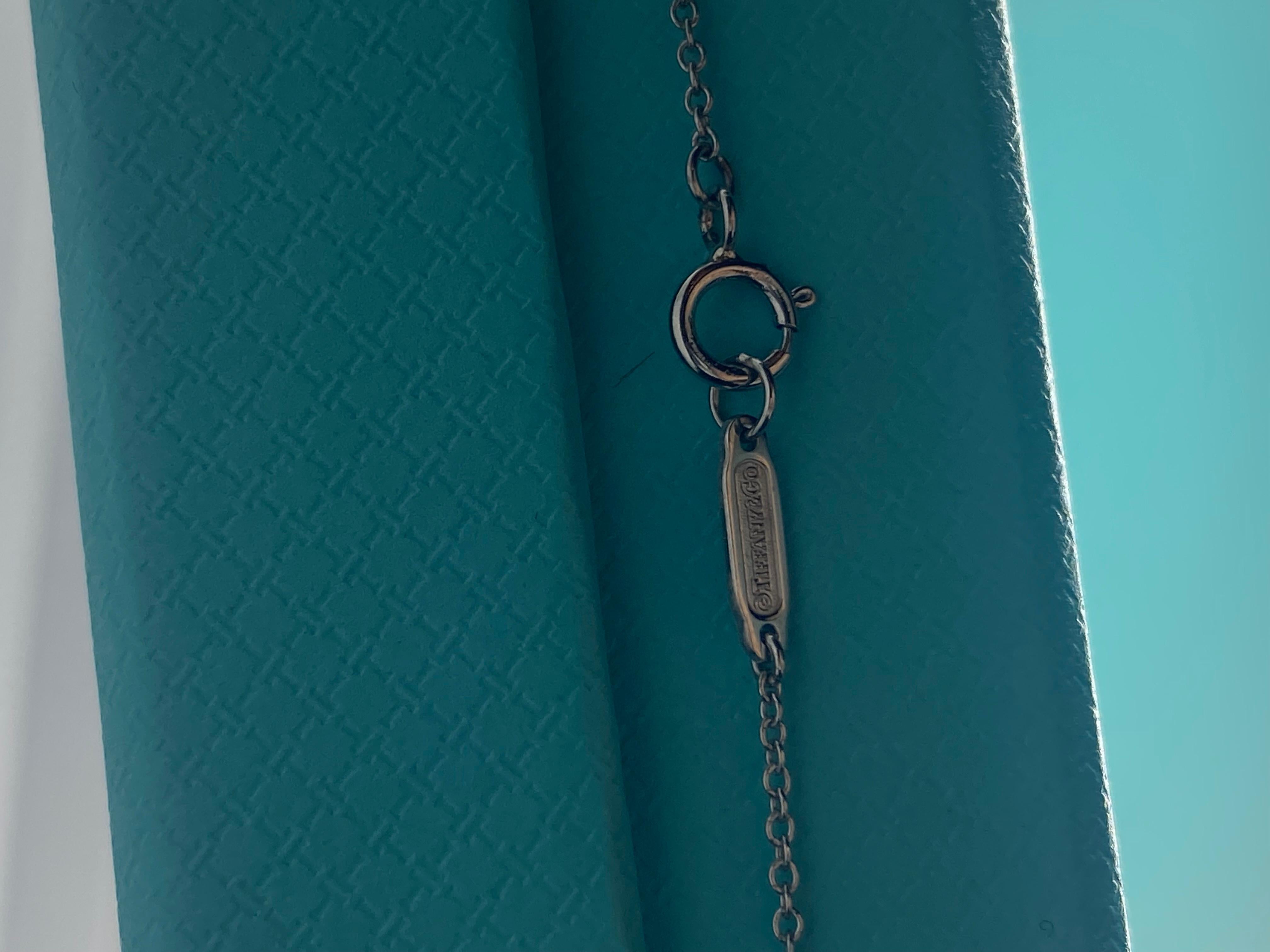 Cruz de diamantes Tiffany Co grande pt950 Corte brillante en venta