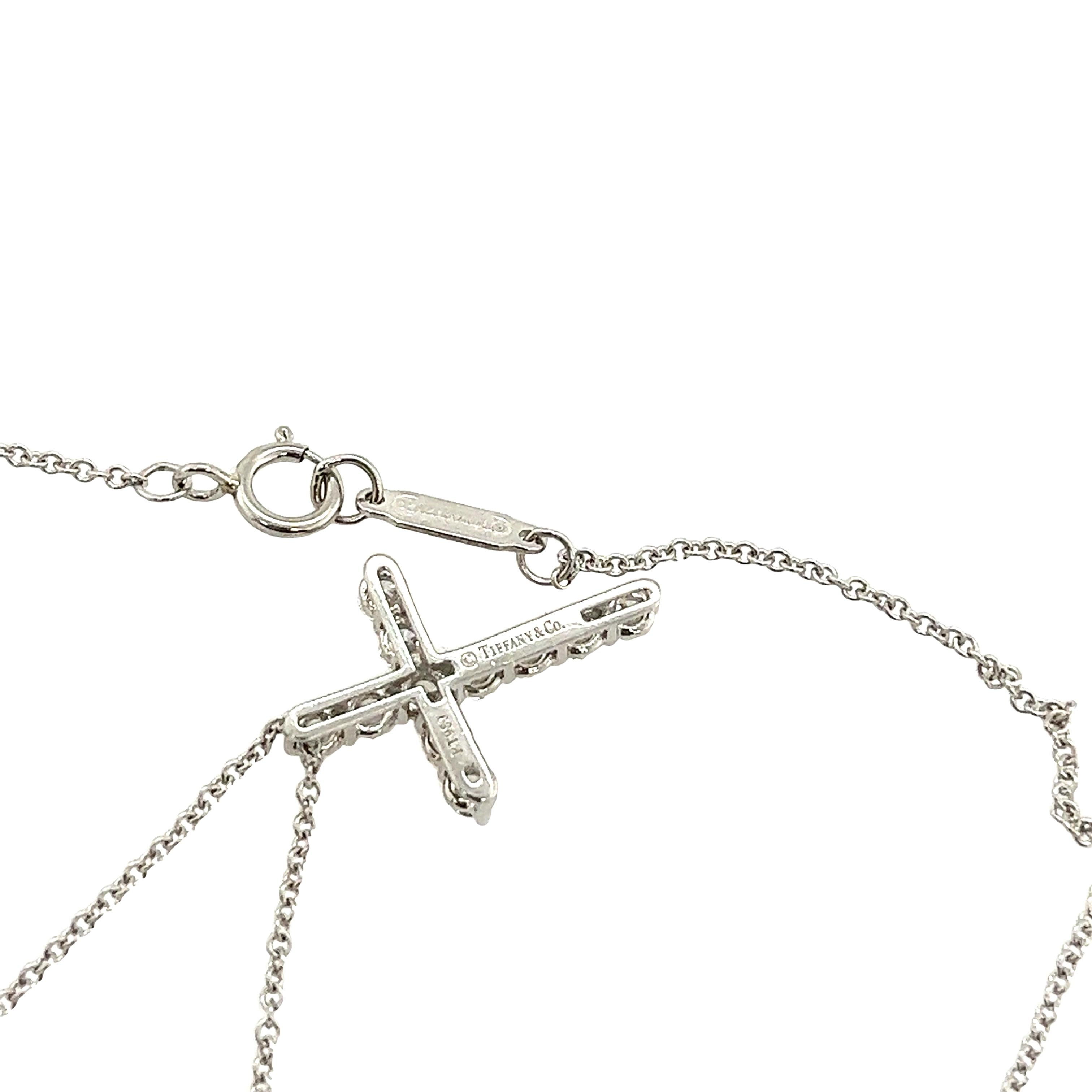 Tiffany & Co. Diamond Cross Pendant set with 0.42ct Round Diamonds For Sale 3