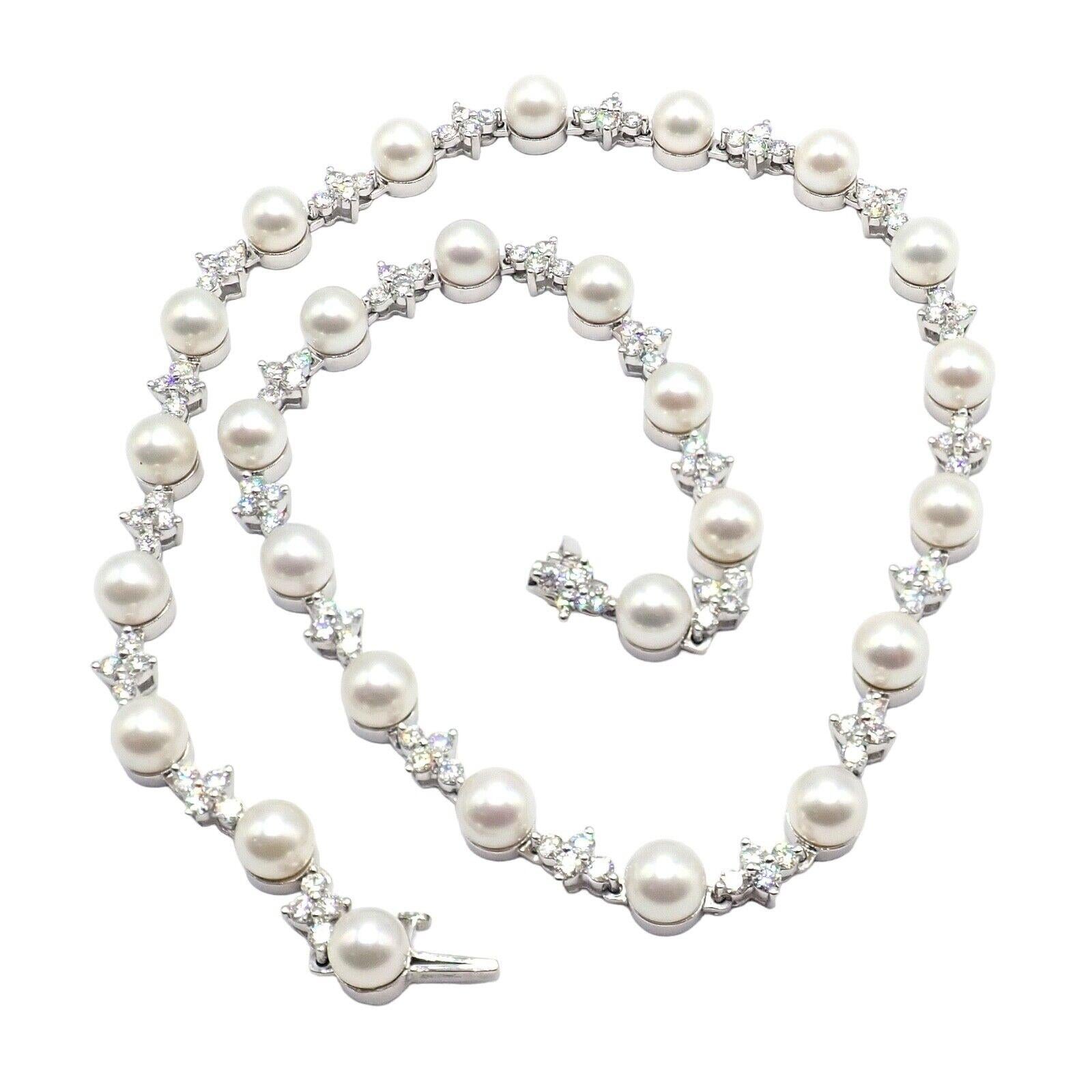 The Authentic! Tiffany & Co Platinum Diamond 6.5mm Pearl Necklace is a captivating piece of jewelry. Made with platinum, it exudes a luxurious and timeless appeal. The necklace showcases stunning 6.5mm pearl motifs, radiating elegance and beauty.