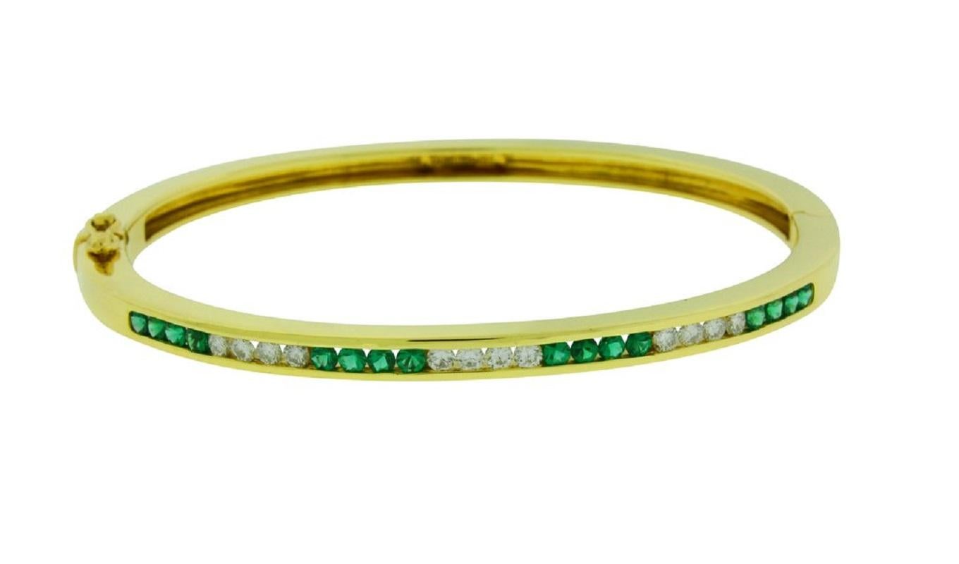 Tiffany & Co. Diamond and Emerald Bangle Bracelet in 18 Karat Gold Size Small In Good Condition In Los Angeles, CA
