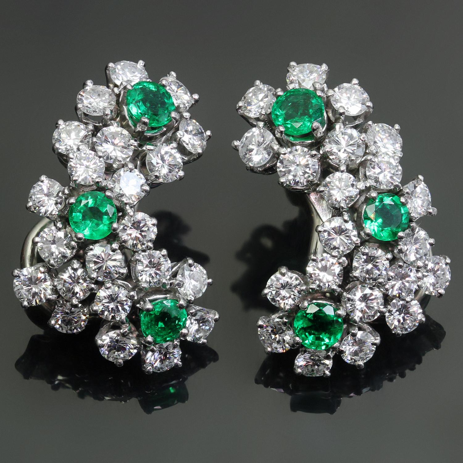 These magnificent Tiffany & Co. clip-on earrings are crafted in platinum and set 6 emeralds of an estimated 1.0 carat and 44 brilliant-cut round F-G VVS2-VS1 diamonds of an estimated 4.0 carats. Made in United States circa 1990s. Measurements: 0.59