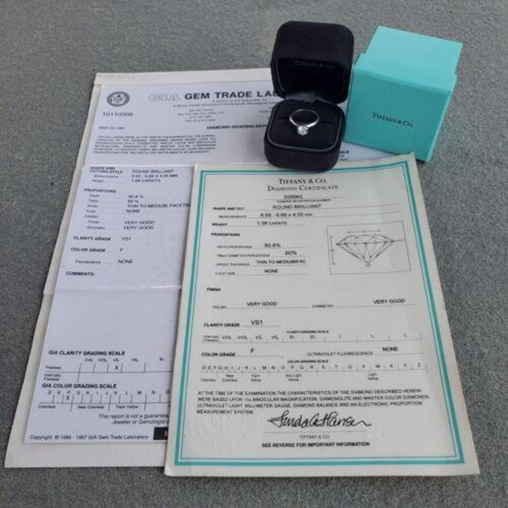 Here we have a Vintage Tiffany engagement ring with original certificate and GIA certificate from 1997, featuring a 1.08 carat round F VS1 diamond in a classic 6 prong platinum Tiffany solitaire ring size 5.5.

More details:
Measurements: Finger