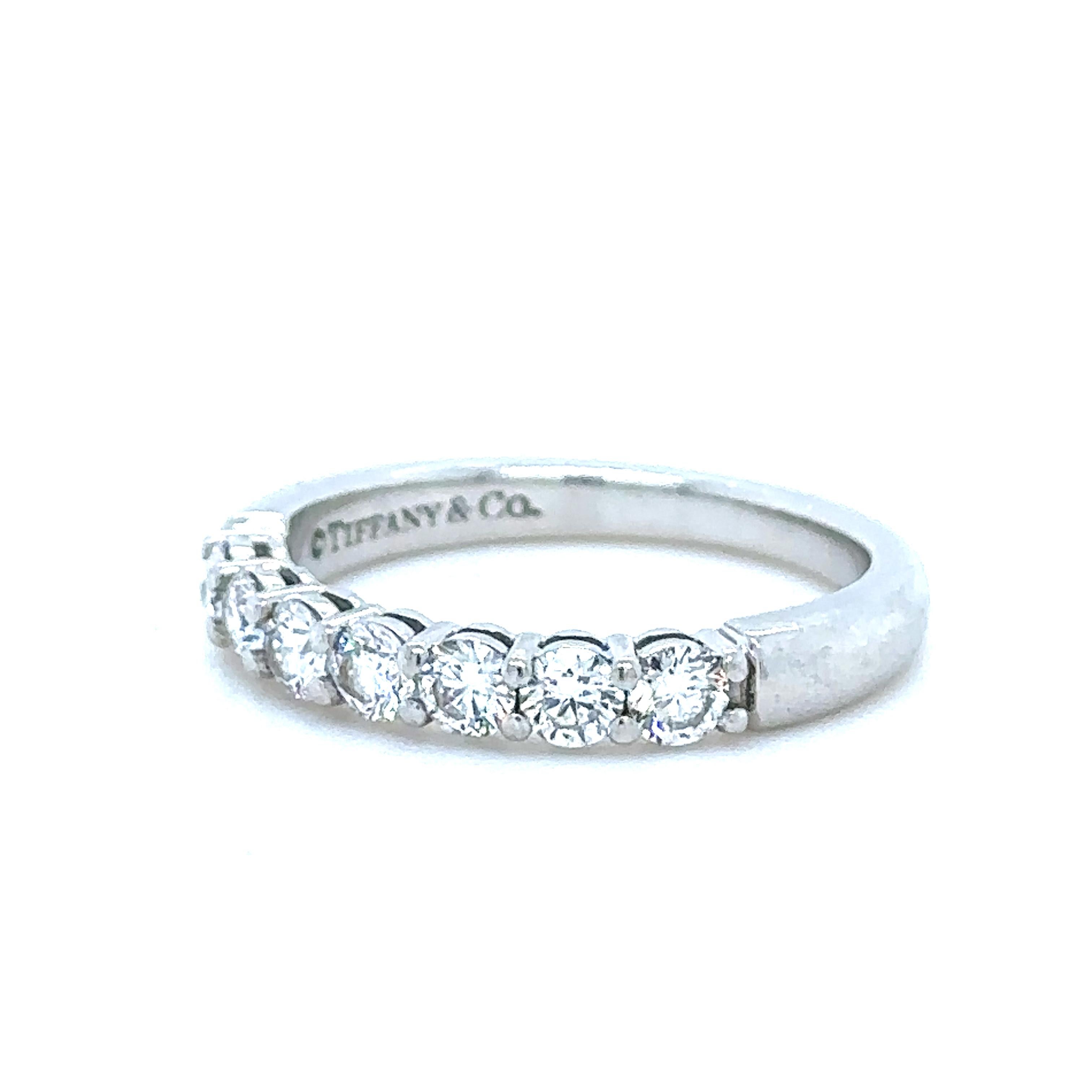Unique features:

A Tiffany & Co Diamond Eternity Ring, made of 950 Platinum, ring size of L1/2, and weighing 4.8 gm.

Set with 7 round, brilliant cut Diamonds, approximately colour F and clarity VS with a total weight of 0.60 ct.

Metal: Platinum