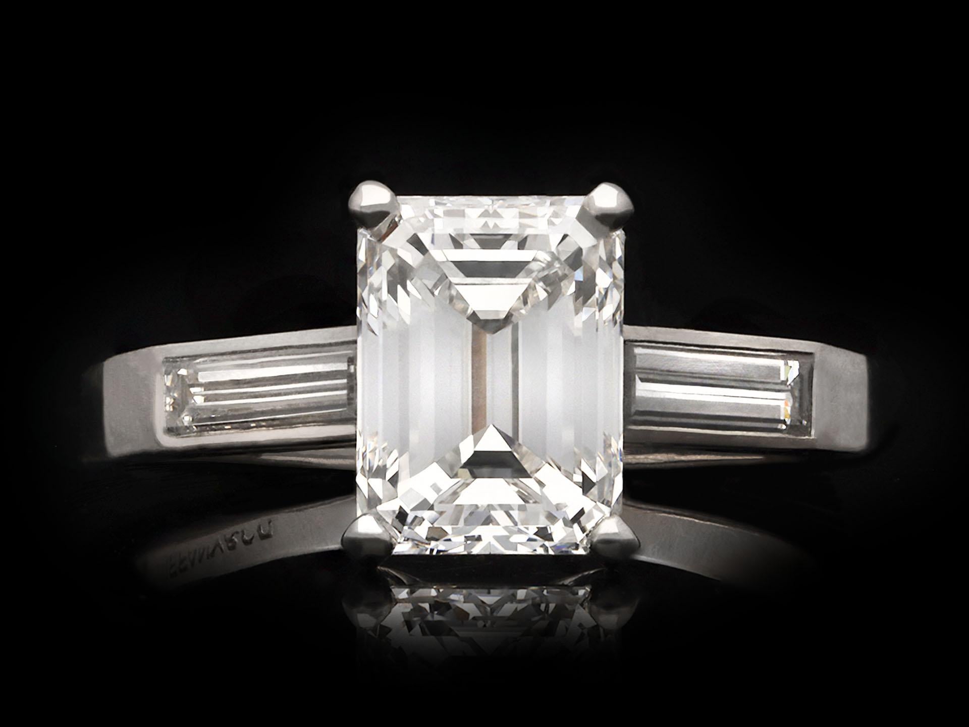 Tiffany & Co. diamond flanked solitaire ring, circa 1950. For Sale 2