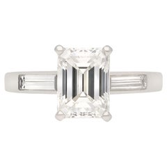 Retro Tiffany & Co. diamond flanked solitaire ring, circa 1950.