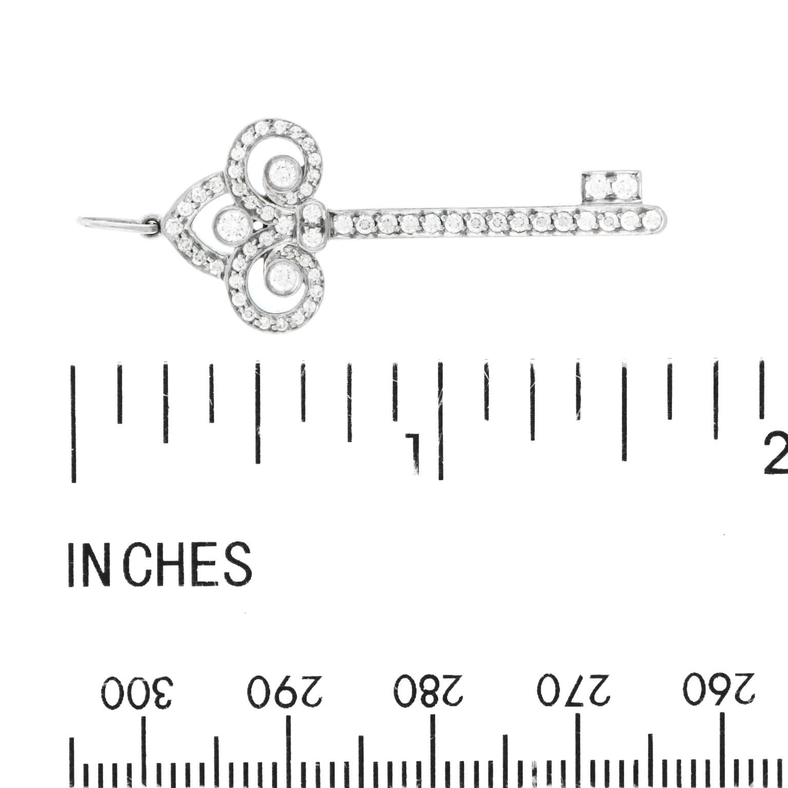 Tiffany & Co. Diamond Fleur-de-lis Platinum Key Pendant In Excellent Condition In Litchfield, CT