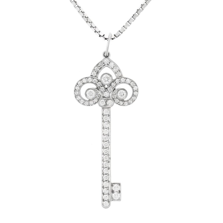 Tiffany and Co. Diamond Fleur-de-lis Platinum Key Pendant at 1stDibs