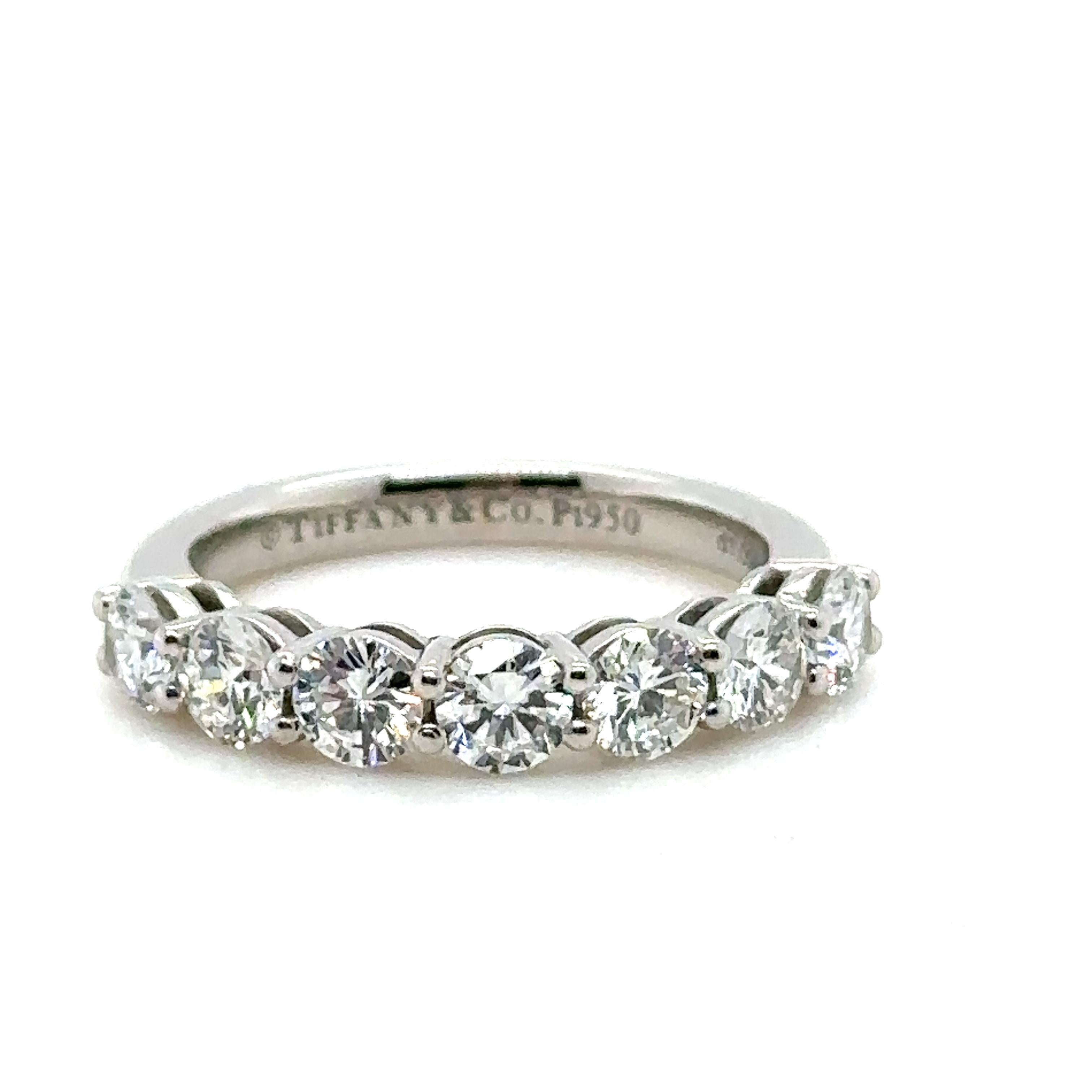 Unique features:

Tiffany & Co. Half eternity diamond ring. 950 Platinum, and weighing 4.43 gm.

Stamped: Tiffany & Co. Pt950.

Set with 7 round, brilliant cut Diamonds, colour F-G and clarity VVS-VS with a total weight of 1.09ct.
Metal: 950