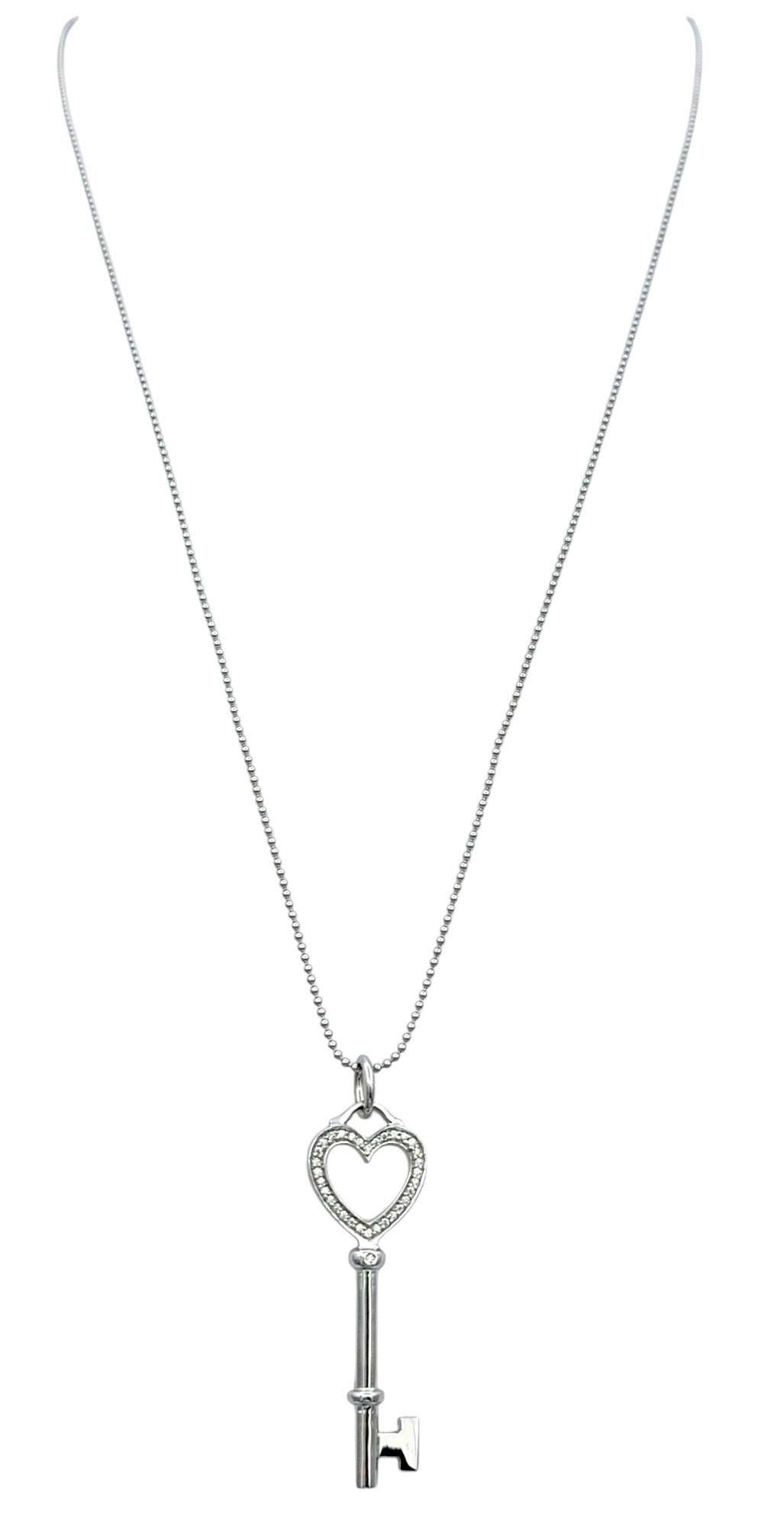 Contemporary Tiffany & Co. Diamond Heart Key Pendant with Bead Chain in 18 Karat White Gold For Sale