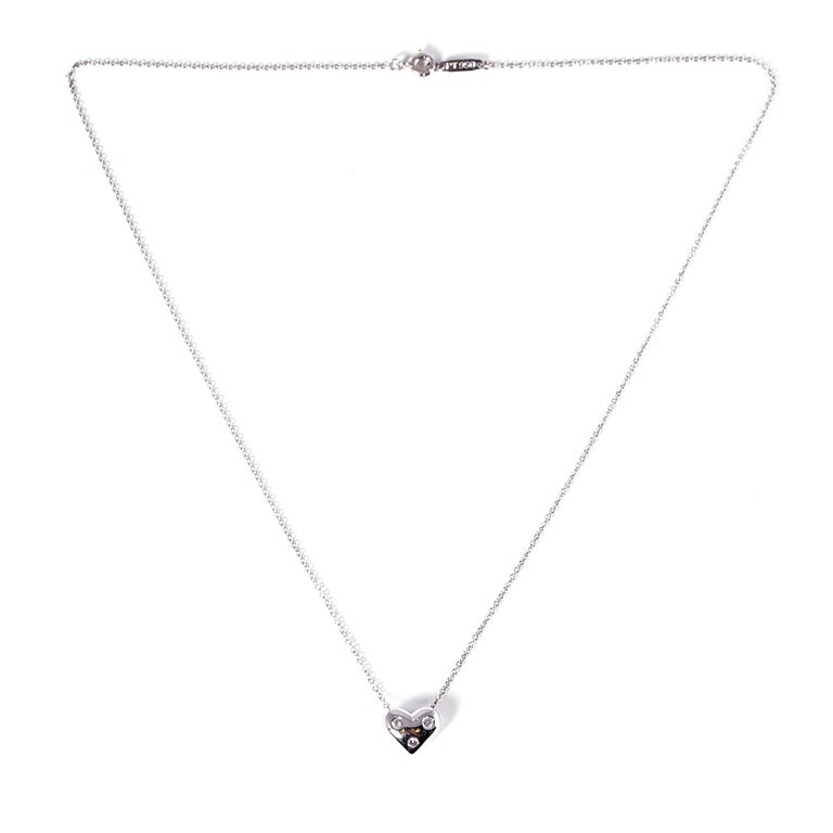 Adorable heart necklace with three diamond on a 16 1/2 inch chain, all in Platinum, from the Tiffany 