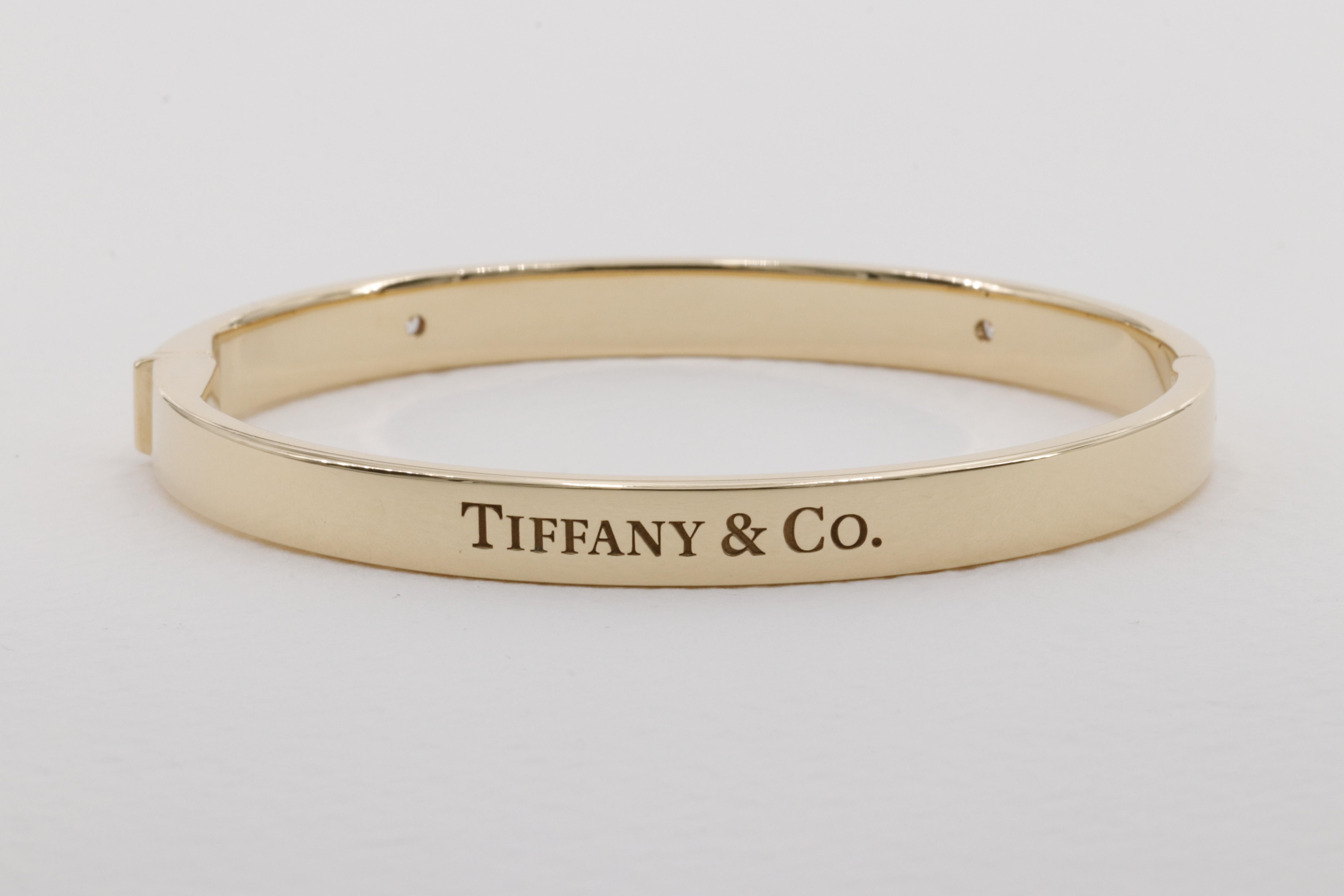 Round Cut Tiffany & Co. Diamond Hinged Bangle in 18 Karat Yellow Gold  For Sale