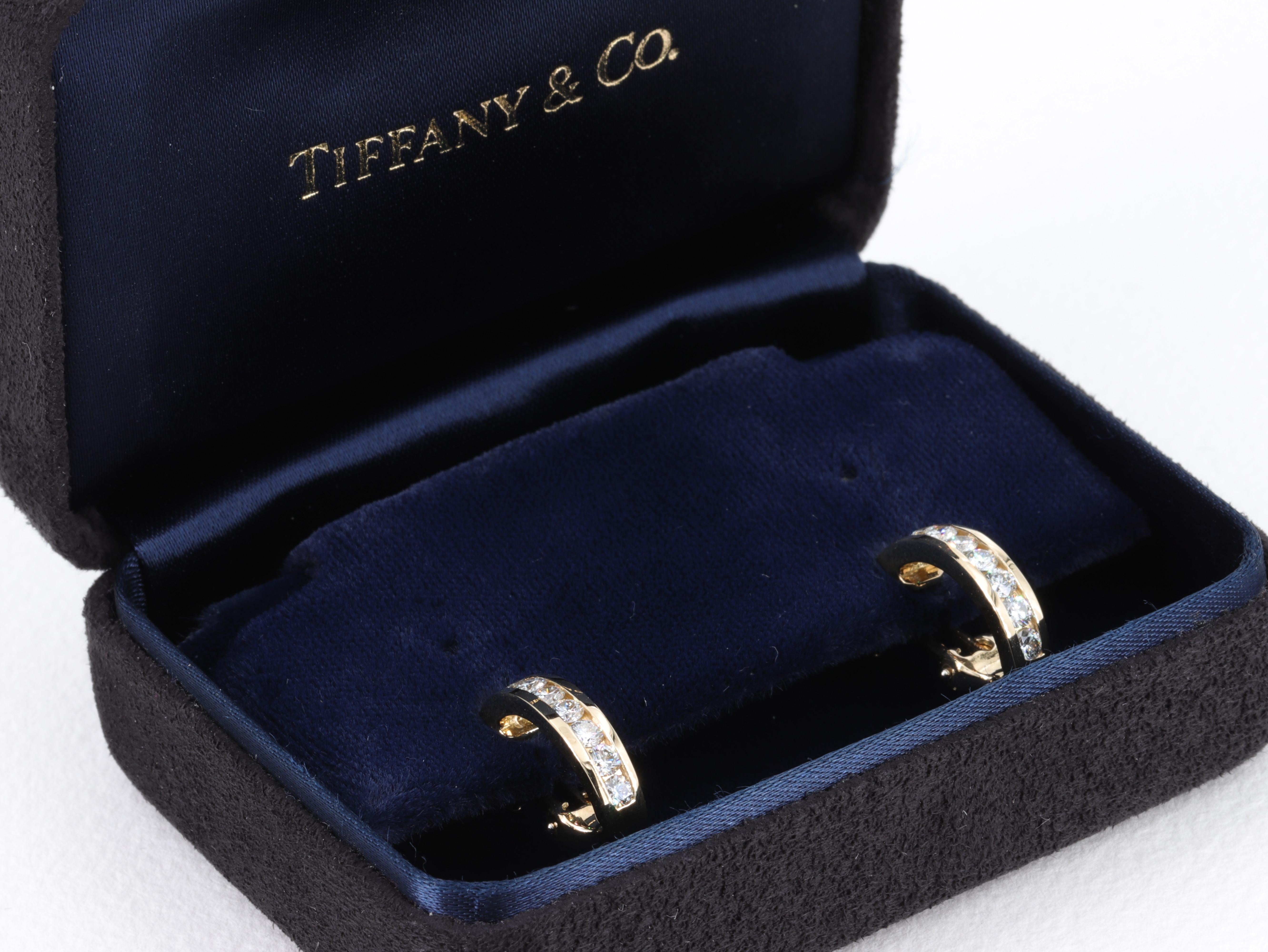 Tiffany & Co. Diamond Huggie Hoop Earrings in 18 Karat Yellow Gold

A great everyday size diamond huggie hoop, set with fine quality round brilliant cut diamonds perfectly channel set in 18 karat yellow gold. 

INCLUDES ORIGINAL INSIDE TIFFANY