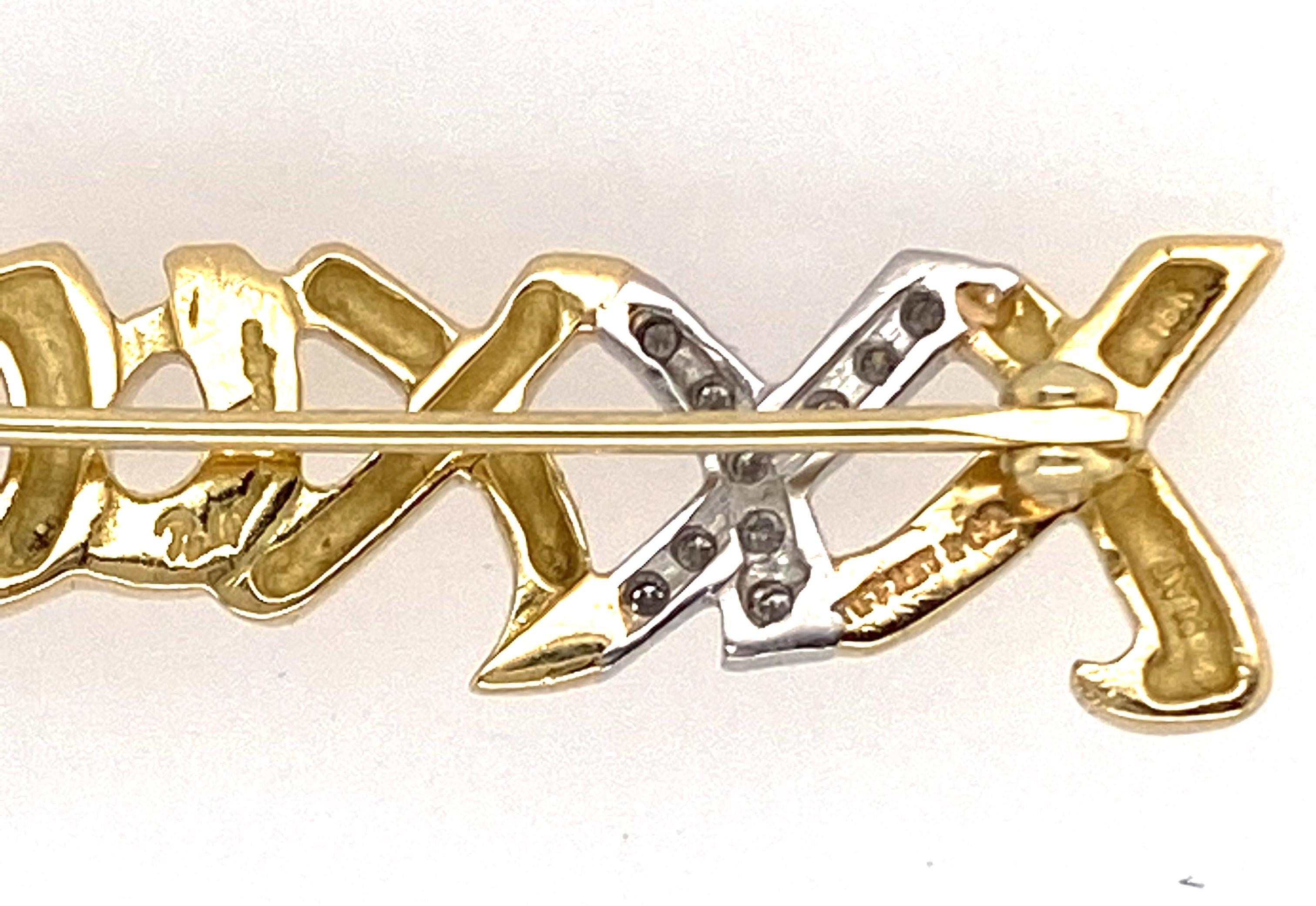 Paloma Picasso diamond XO pin, diamonds weighing approx. 0.15 ct EF VS, measures 1 1/2 inch, weight 3.2 dwt.