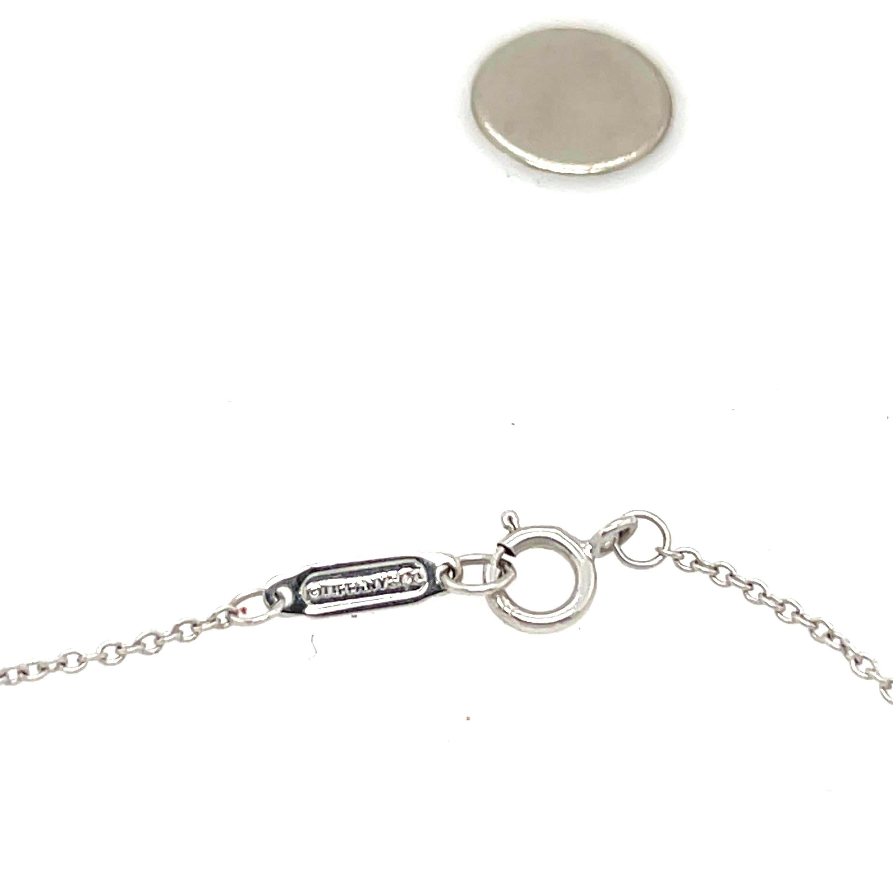 Collana con ciondolo a forma di fiocco con diamante di Tiffany & Co. in oro bianco 18 ct. in vendita 2