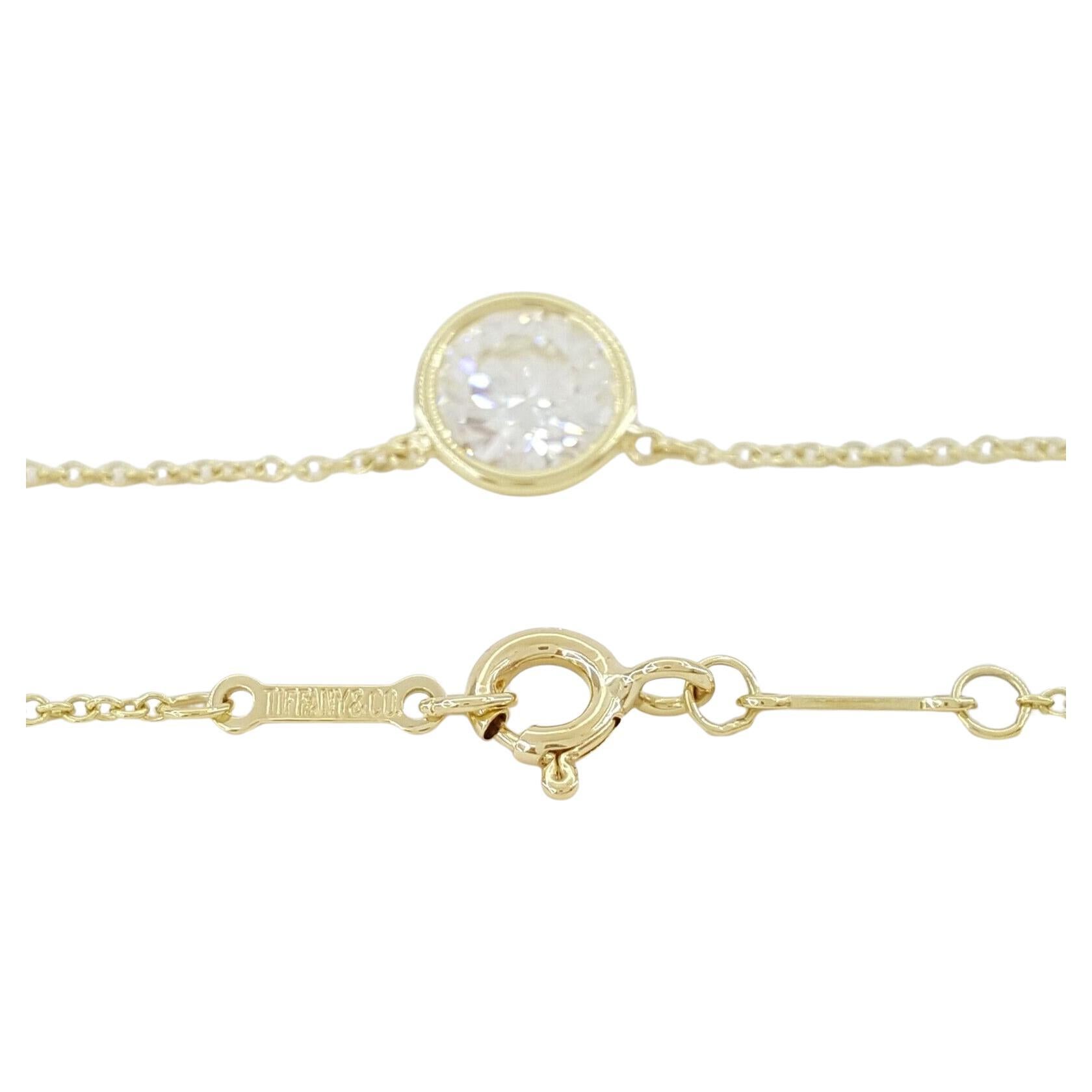 TIFFANY & CO. Elsa Peretti Diamond By The Yard Necklace 
5.0 x 5.0 x 3.0mm, approx 0.5ct, about F and VVS range

Necklace 18 inches long

Marked: Tiffany & Co. 750 Peretti

Total Weight : 2.1 grams