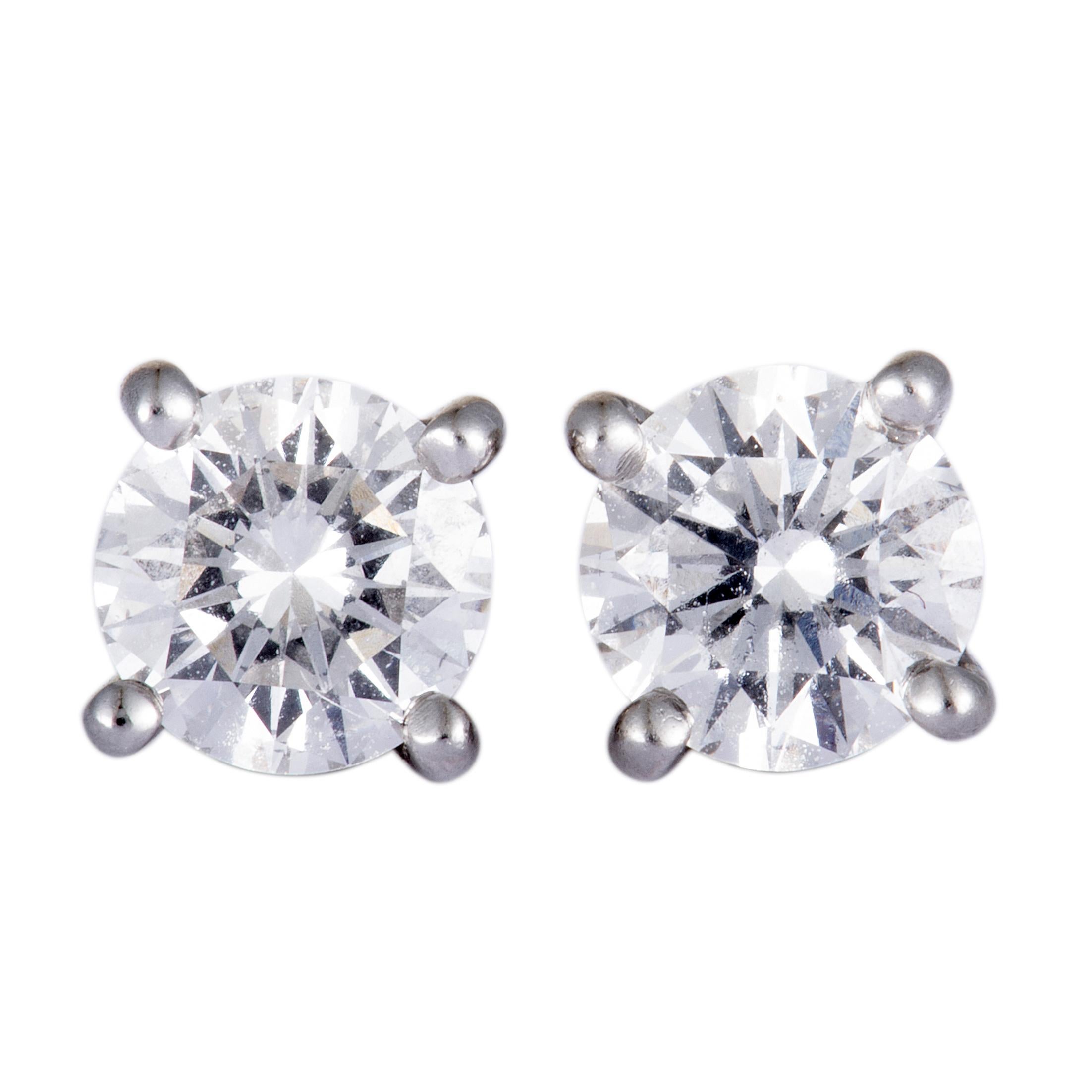 These extraordinary Tiffany & Co. earrings are ingeniously designed in a way that allows you to wear them as simple, understated studs that will accentuate your look in a delightfully elegant manner, or combined - as incredibly stylish yet