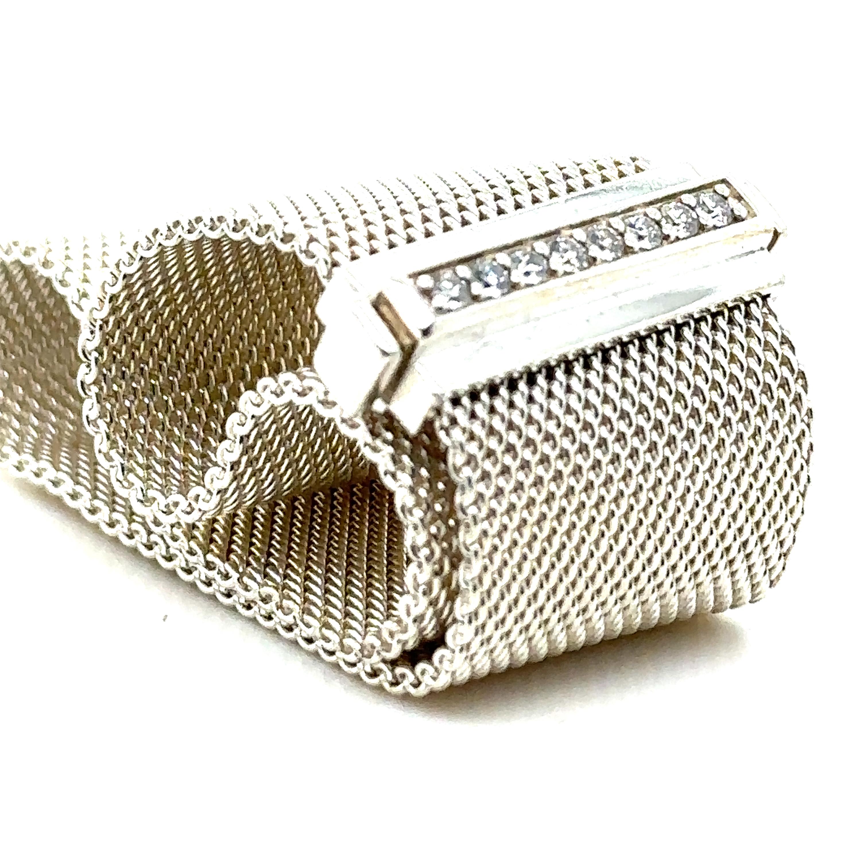 A Tiffany & Co Diamond Mesh Somerset Bracelet.

Casual and refined, modern and elegant. Wide bracelet in sterling silver with round brilliant diamonds.

Extremely Rare Piece - DISCONTINUED IN 2015

Metal: 925 Sterling Silver
Carat: 0.21ct
Colour: