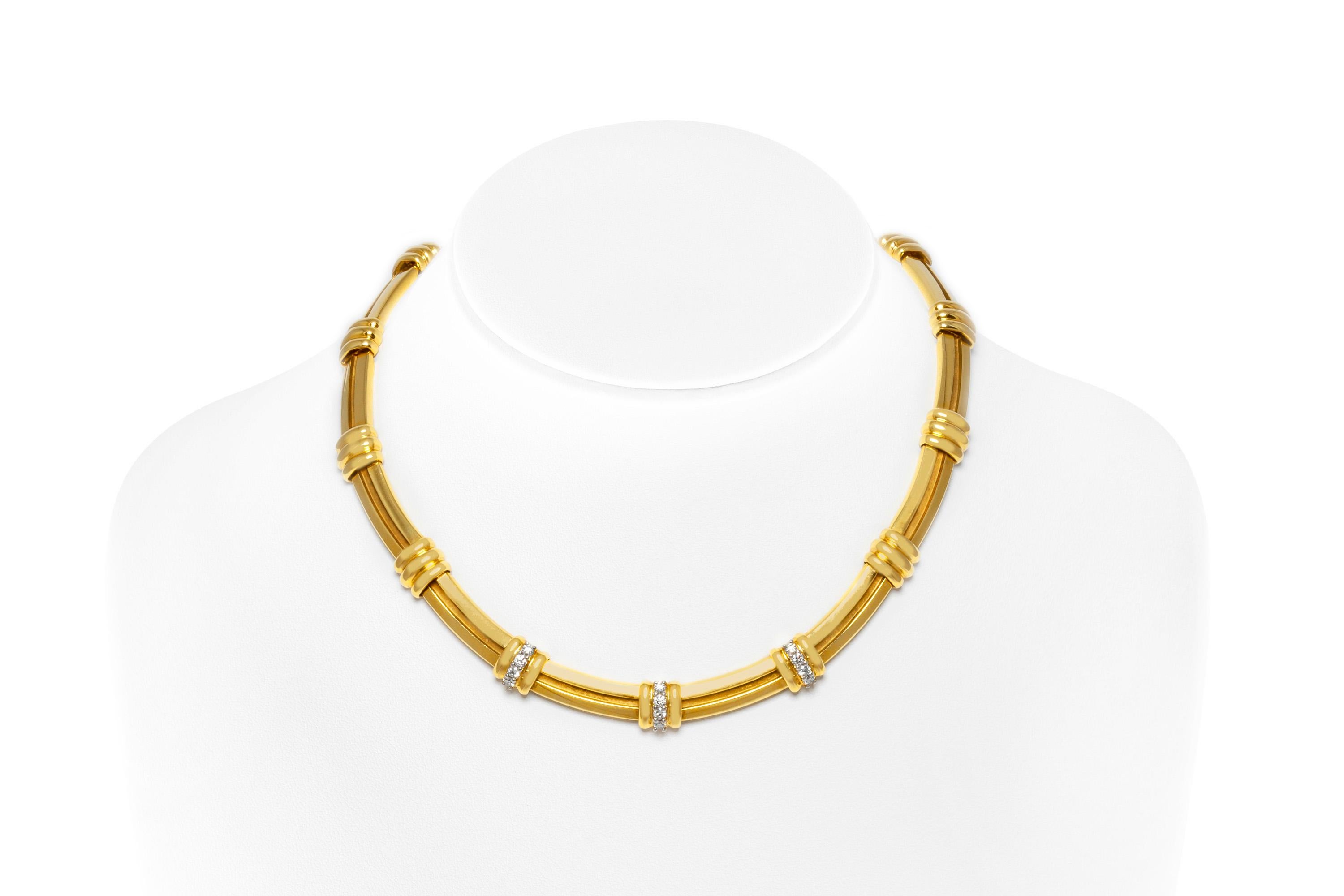 Tiffany & Co. necklace, finely crafted in 18k yellow gold with diamonds weighing approximately a total of 0.80 carats. Circa 1970's.