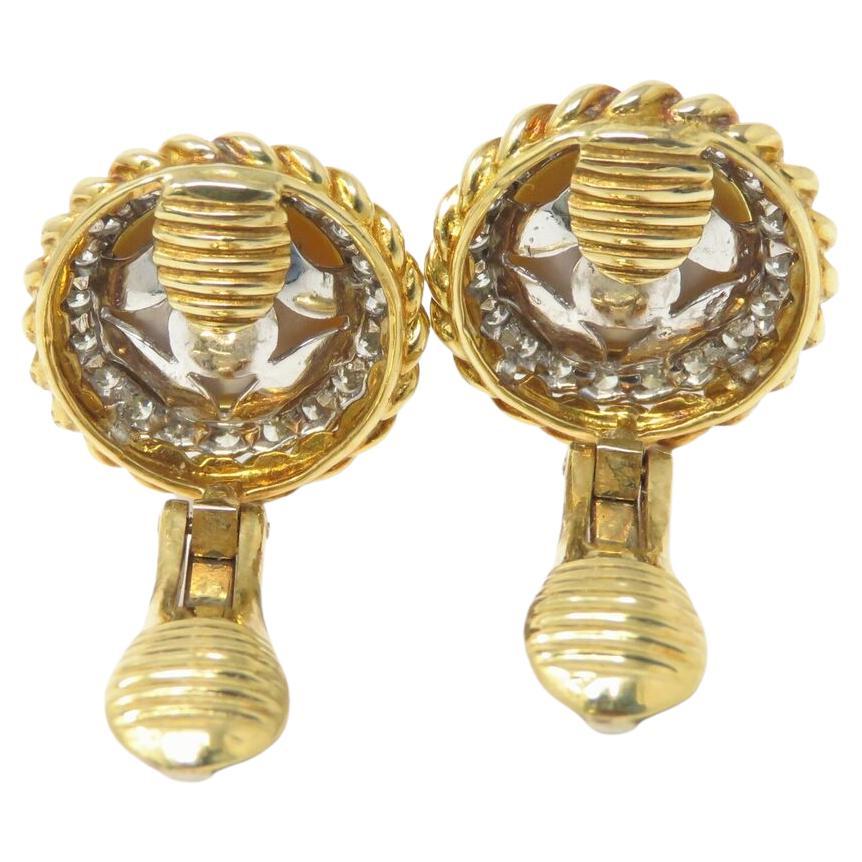 Discover the elegance of Tiffany & Co. with these exquisite earrings, featuring approximately 1.4 carats total weight of sparkling diamonds, primarily in the G-H color range and VS clarity. Adorned with lustrous pearls measuring about 13mm, these