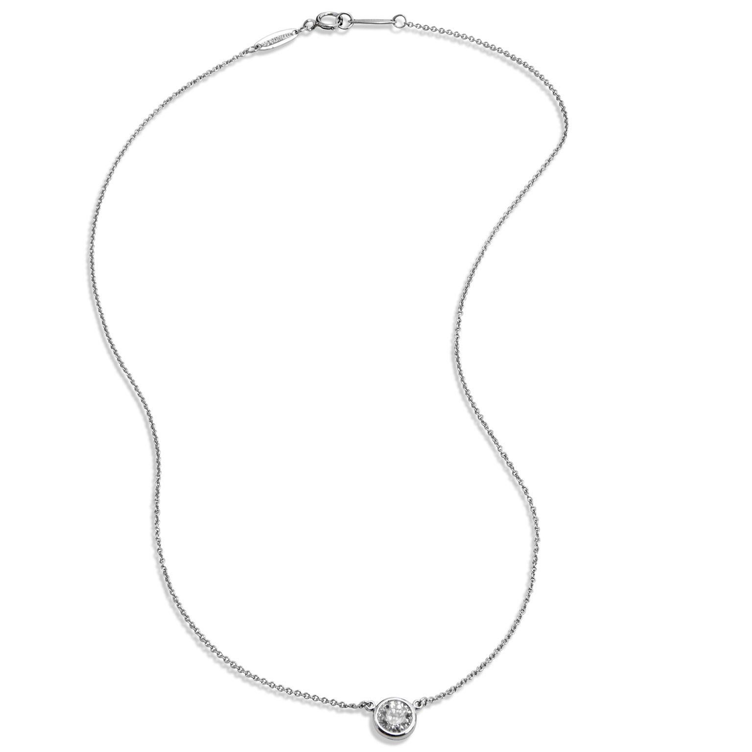 Tiffany & Co. Diamond Pendant necklace by Elsa Peretti

This elegant bezel set diamond solitaire is set in platinum and is made by Tiffany & Co. The designer is Elsa Peretti. The serial number is 26621968. 
The diamond has a total carat weight of