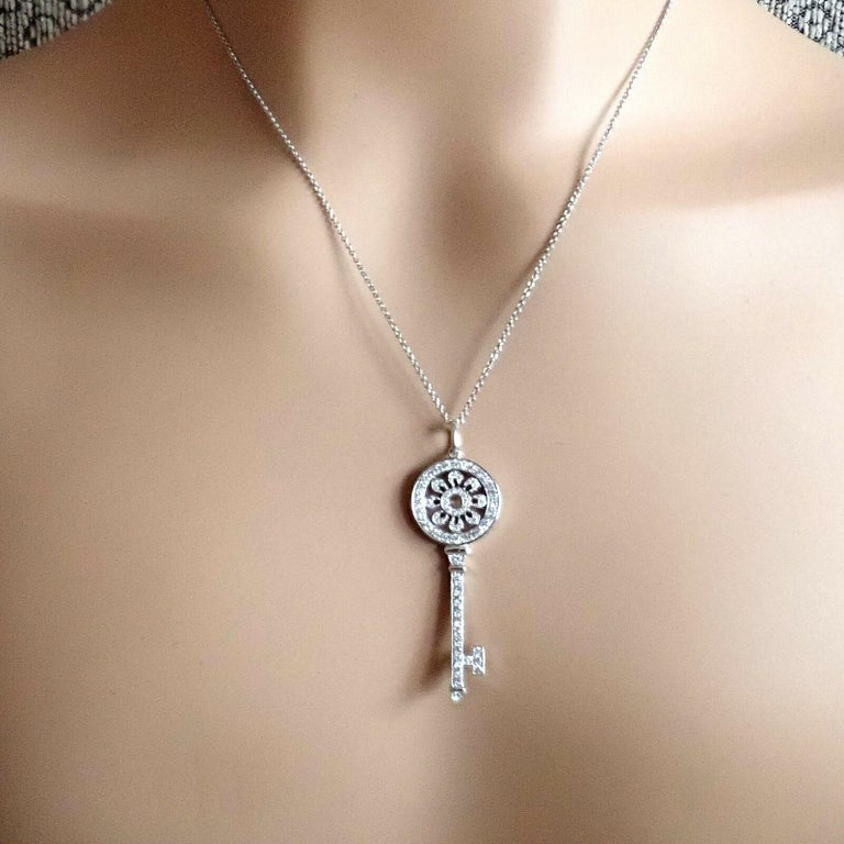 Tiffany and Co Diamond Petals Key Platinum Pendant Necklace For Sale at