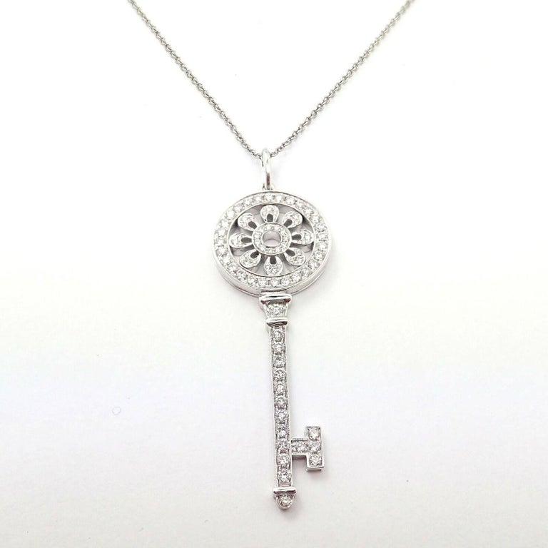 Tiffany and Co Diamond Petals Key Platinum Pendant Necklace For Sale at