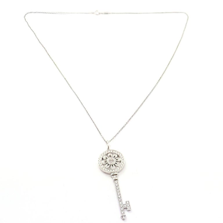 Tiffany and Co Diamond Petals Key Platinum Pendant Necklace For Sale at