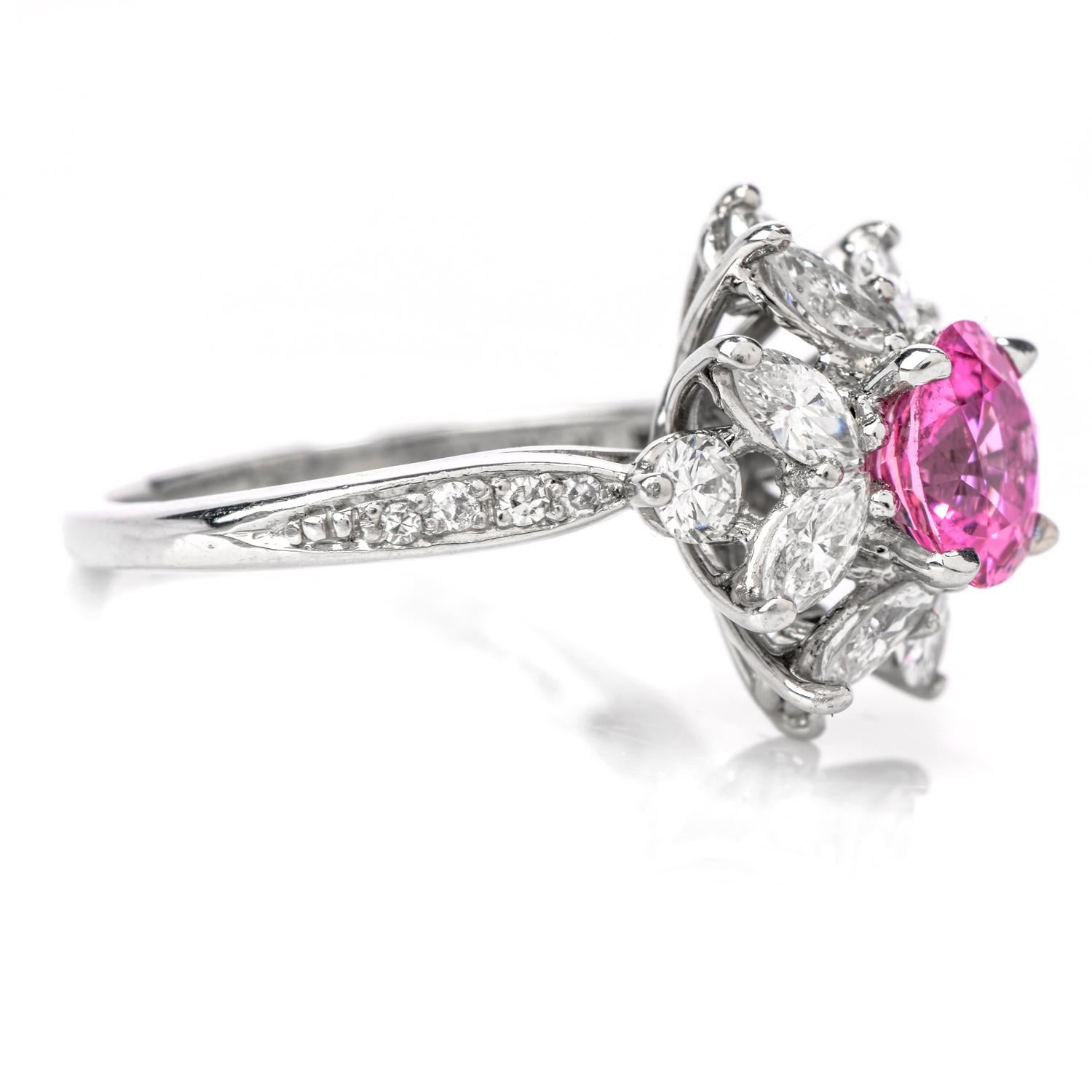 Feel pretty in pink, with this romantic Tiffany & Co. Diamond Pink Sapphire Platinum Round Marquis Halo Ring!  This ring is crafted by the renowned Tiffany & Co. in quality platinum.  The center stone is 1 round pink sapphire, set by delicate claw