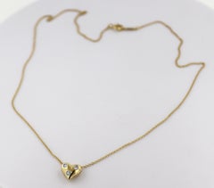 Tiffany & Co., Diamond, Platinum, 18k Yellow Gold Etoile Puffed Heart Pendant