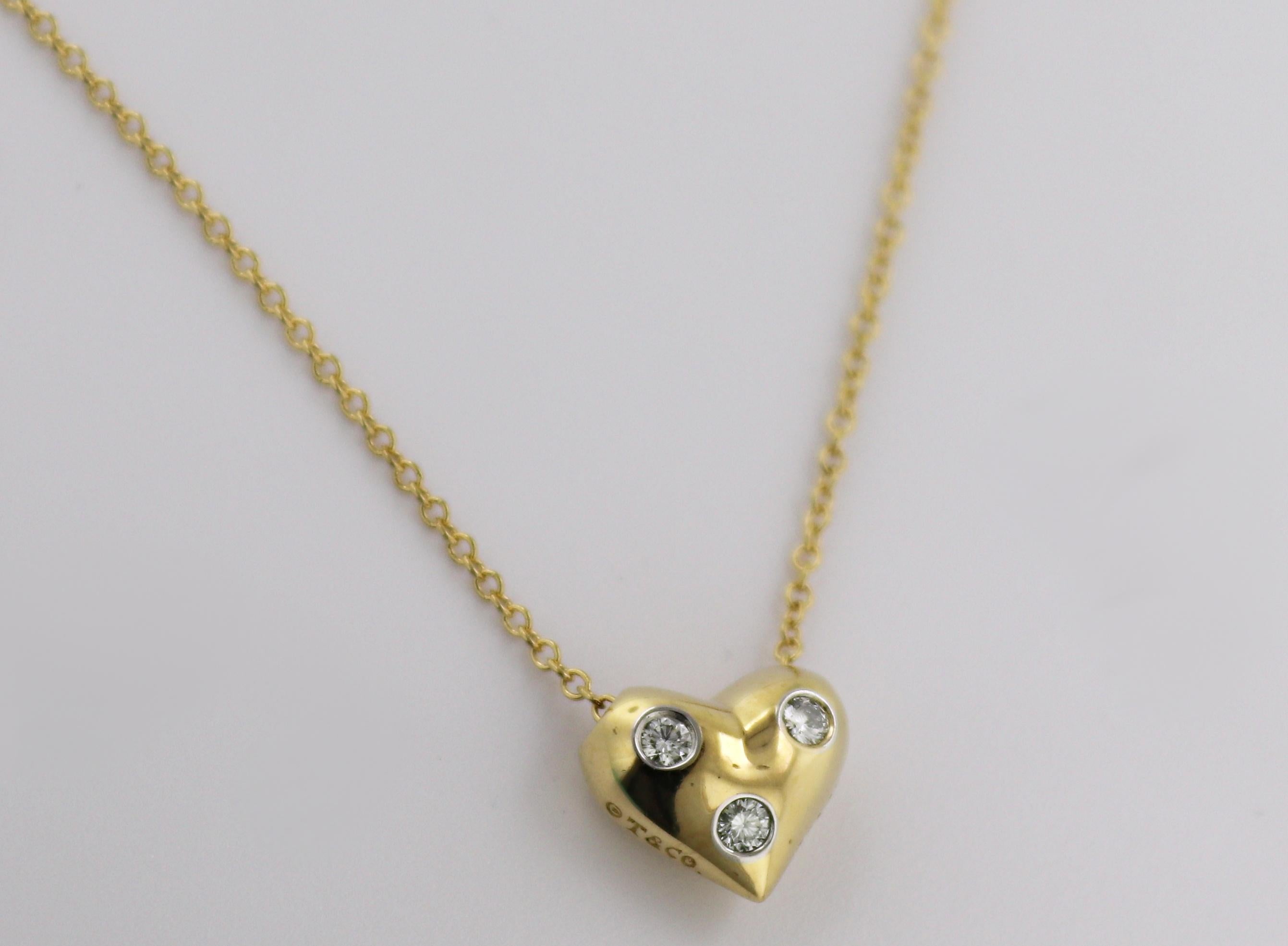 Artisan Tiffany & Co., Diamond, Platinum, 18k Yellow Gold Etoile Puffed Heart Pendant For Sale