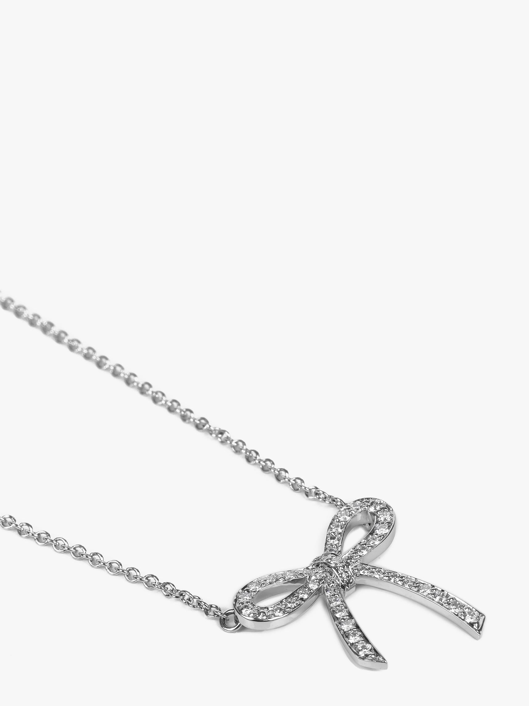 Round Cut Tiffany & Co. Diamond Platinum Bow Necklace For Sale