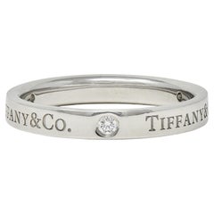 Tiffany 
Co. Diamond Platinum Contemporary Logo Band Ring
