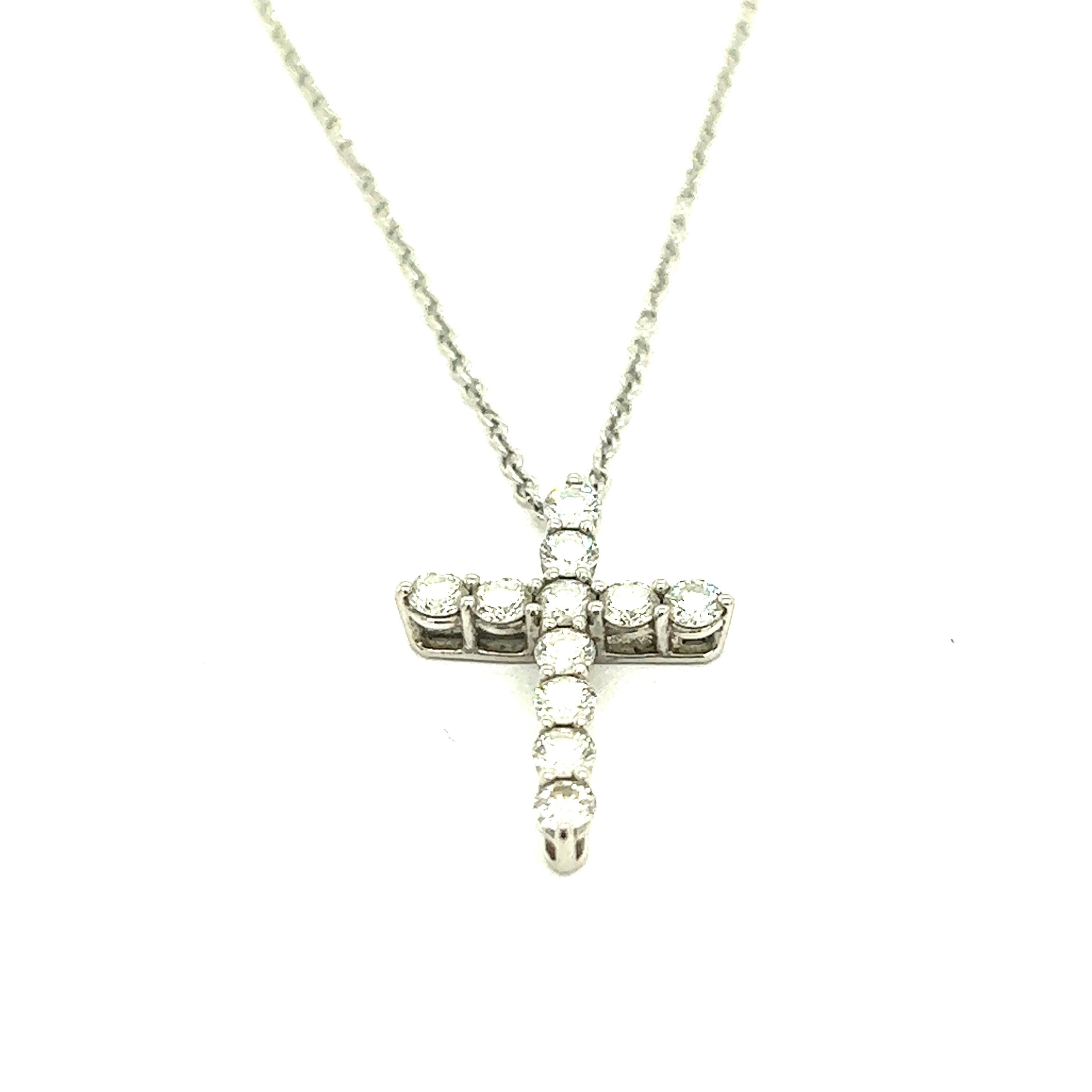 Tiffany & Co. Diamond Platinum Cross Pendant Necklace

Eleven round-cut diamonds, set on platinum, featuring a cross motif; marked Tiffany & Co., PT950 (pendant); Tiffany & Co., PT 950 (chain)

Size: Pendant width 1.2 cm, length 1.7 cm; Chain length