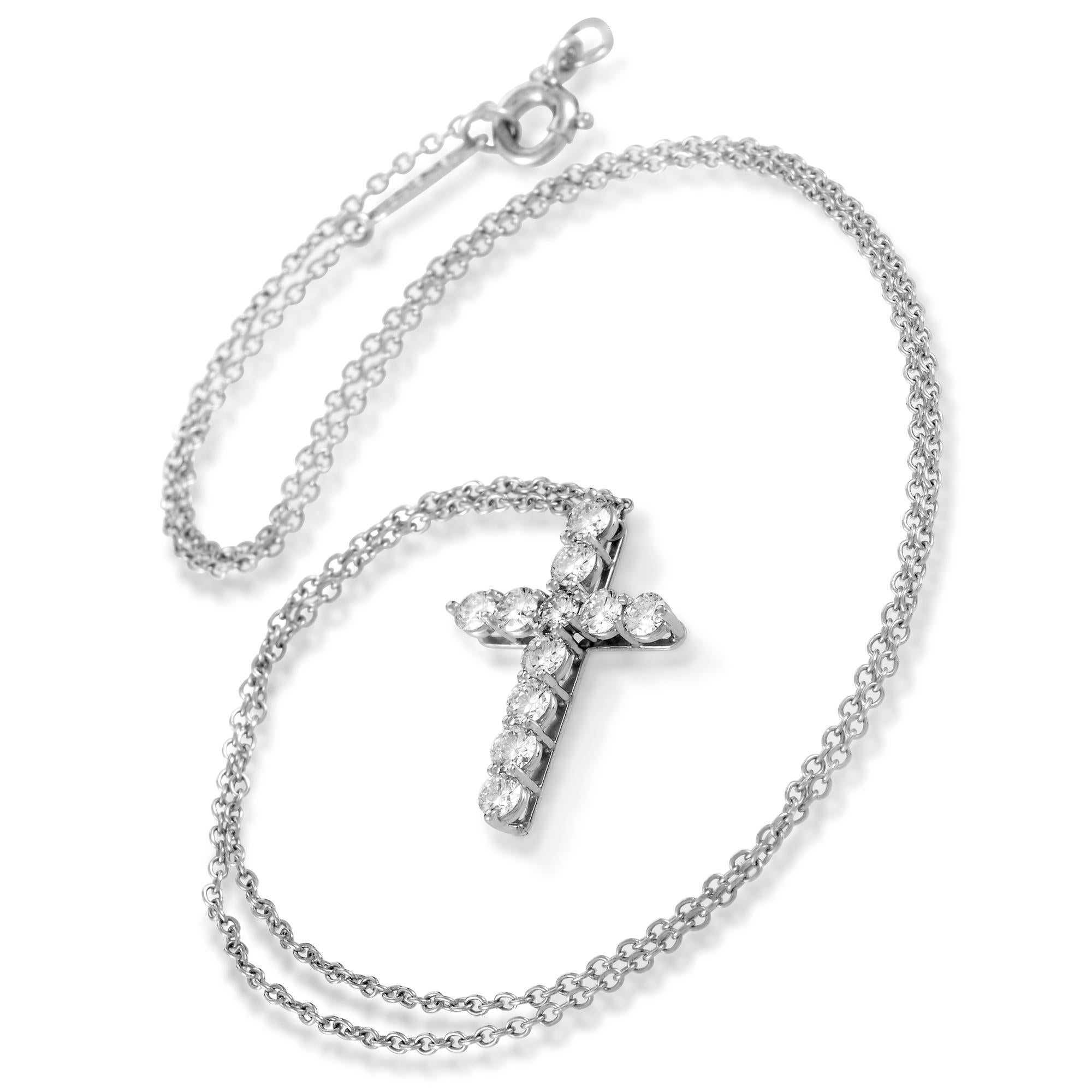 This luxurious Tiffany & Co. necklace comes with a neatly crafted rolo chain from which hangs a dazzling cross pendant lavishly set with diamonds weighing 0.42ct in total. The necklace is made of finest 950 platinum and weighs 3.5 grams.

Included