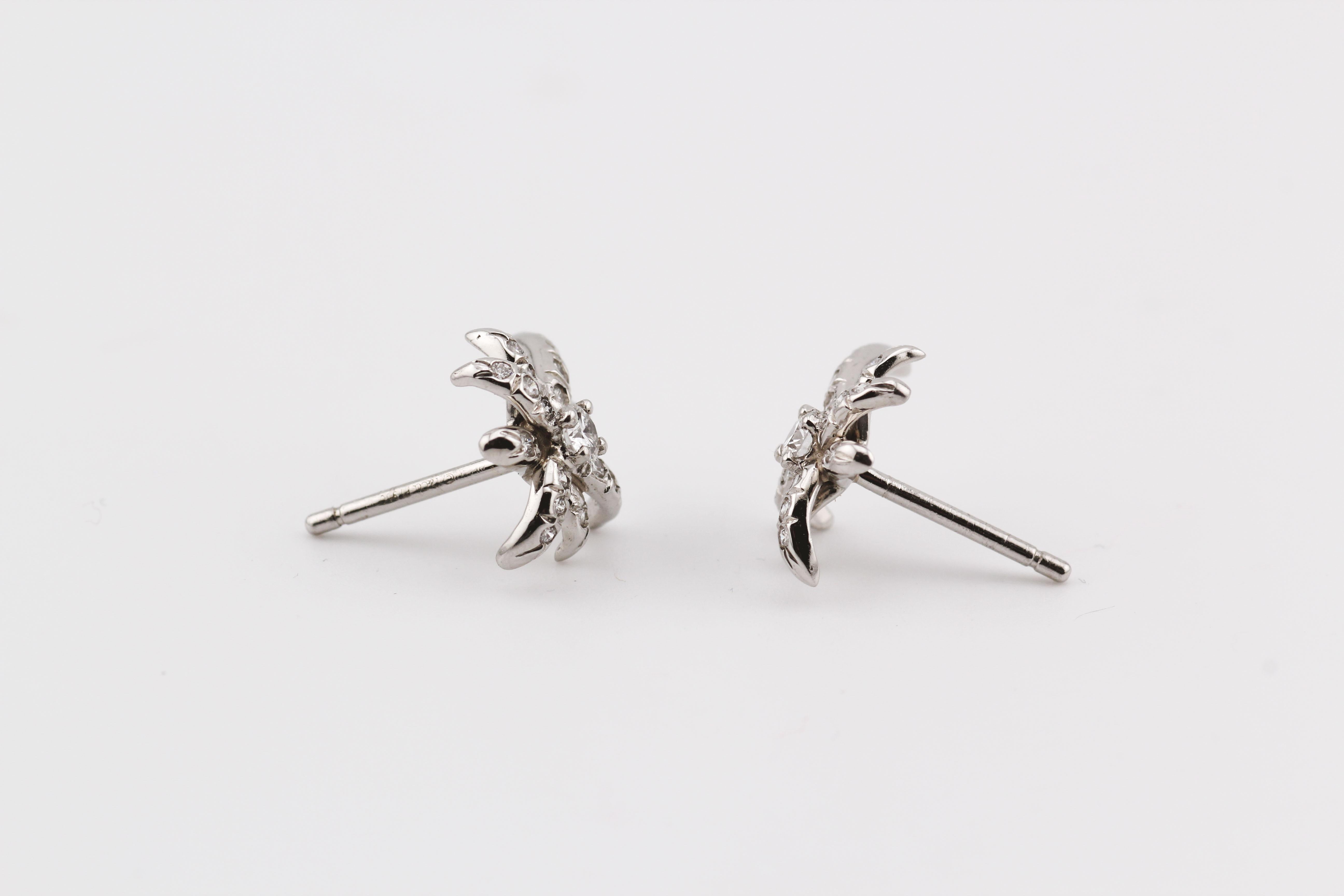 The Diamond Fireworks Earrings are a striking and luxurious accessory, designed to captivate with their radiant brilliance. Crafted with precision, these earrings feature a unique fireworks motif, each adorned with meticulously set diamonds that