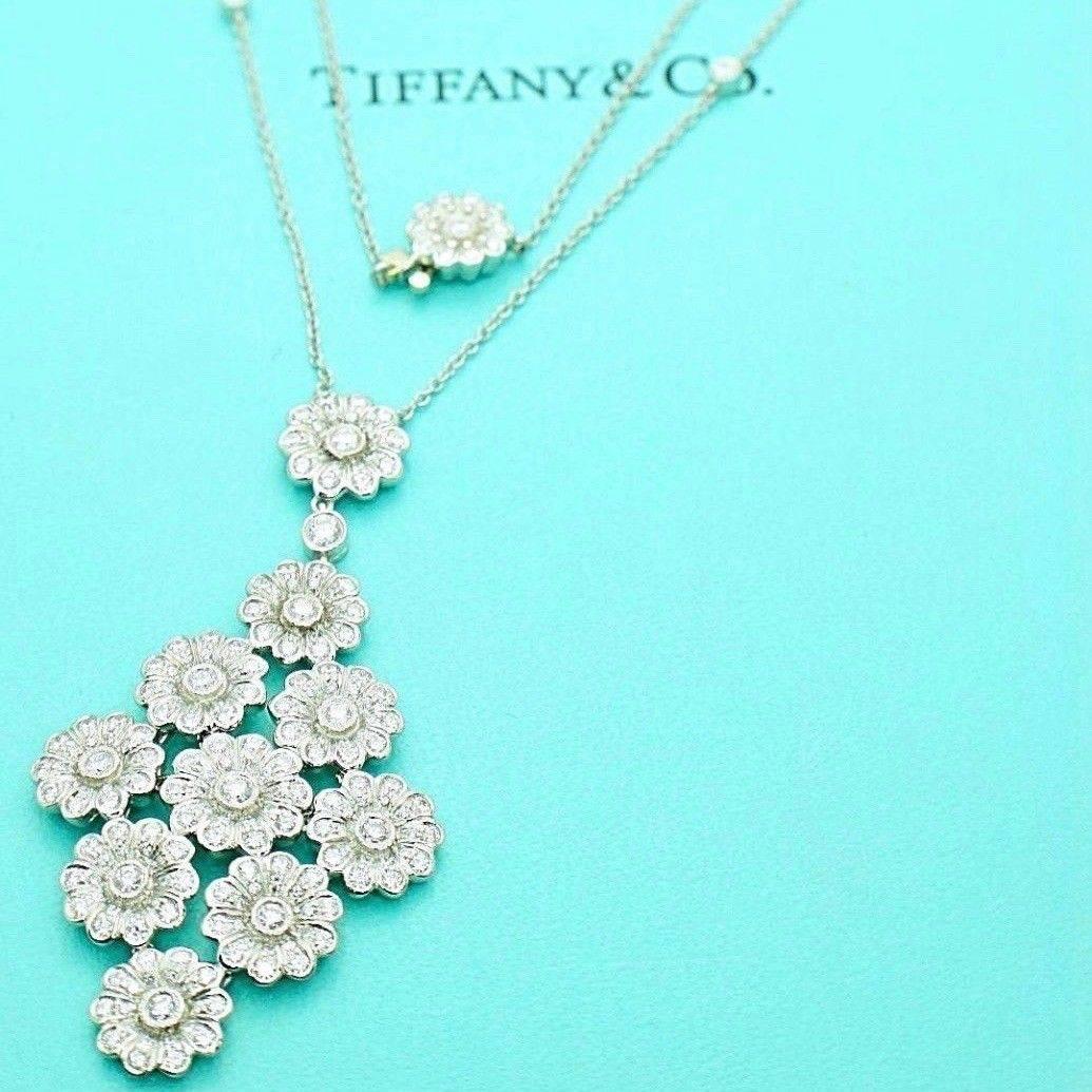 Tiffany & Co 
Tiffany Rose Collection Diamond Pendant Necklace in Platinum.  
Round Brilliant Cut Diamonds 2.09 TCW E - F color, VVS - VS clarity.  
Chain is 16 Inches and Pendant is 2.25 Inches.... 
Total Length is 18.25 Inches.  
Hallmark 