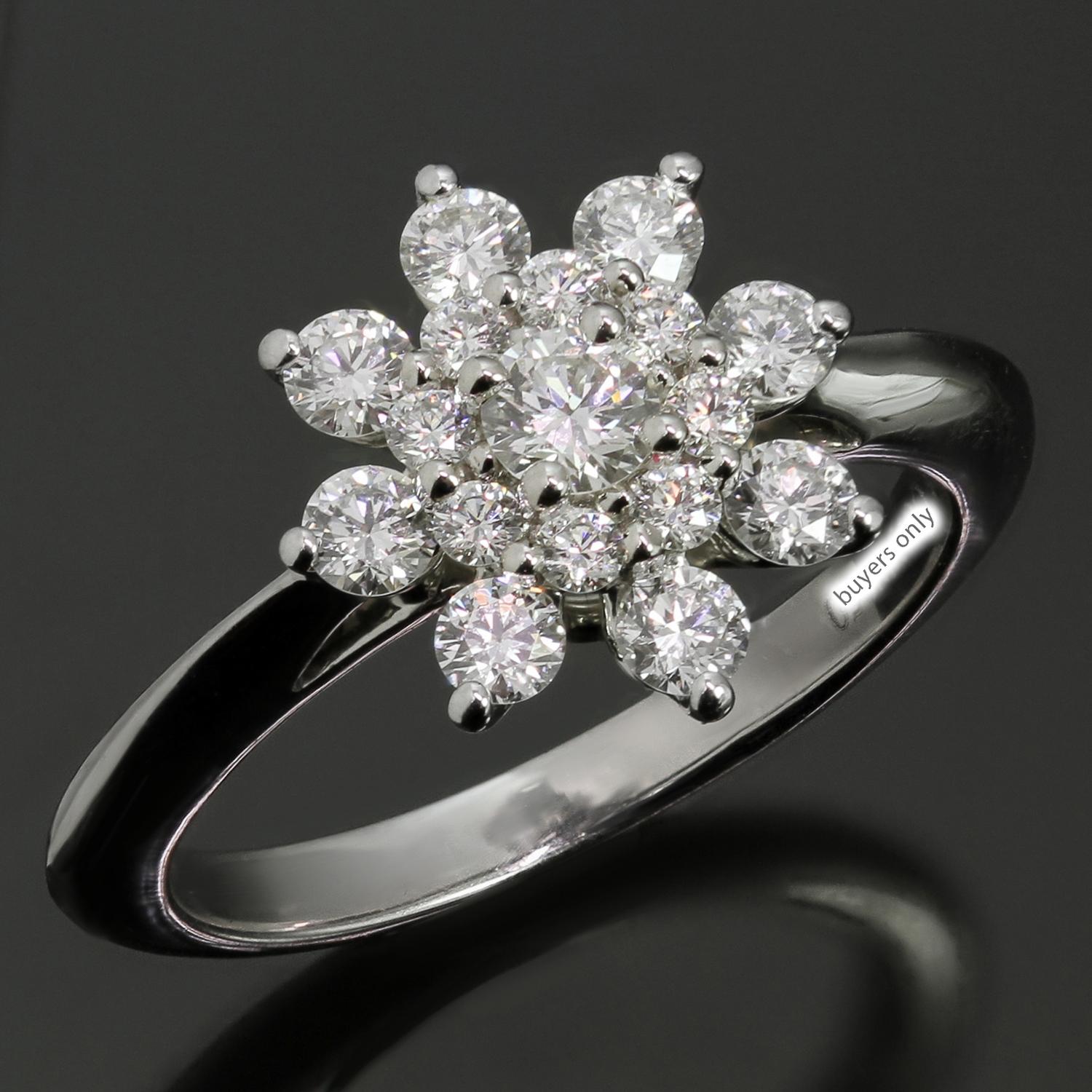 This stunning Tiffany & Co. ring features a delicate flower design crafted in 950 platinum and set with round brilliant F-G VVS2-VS1 diamonds weighing an estimated 0.80 carats. Made in United States circa 2010s. Measurements: 0.43