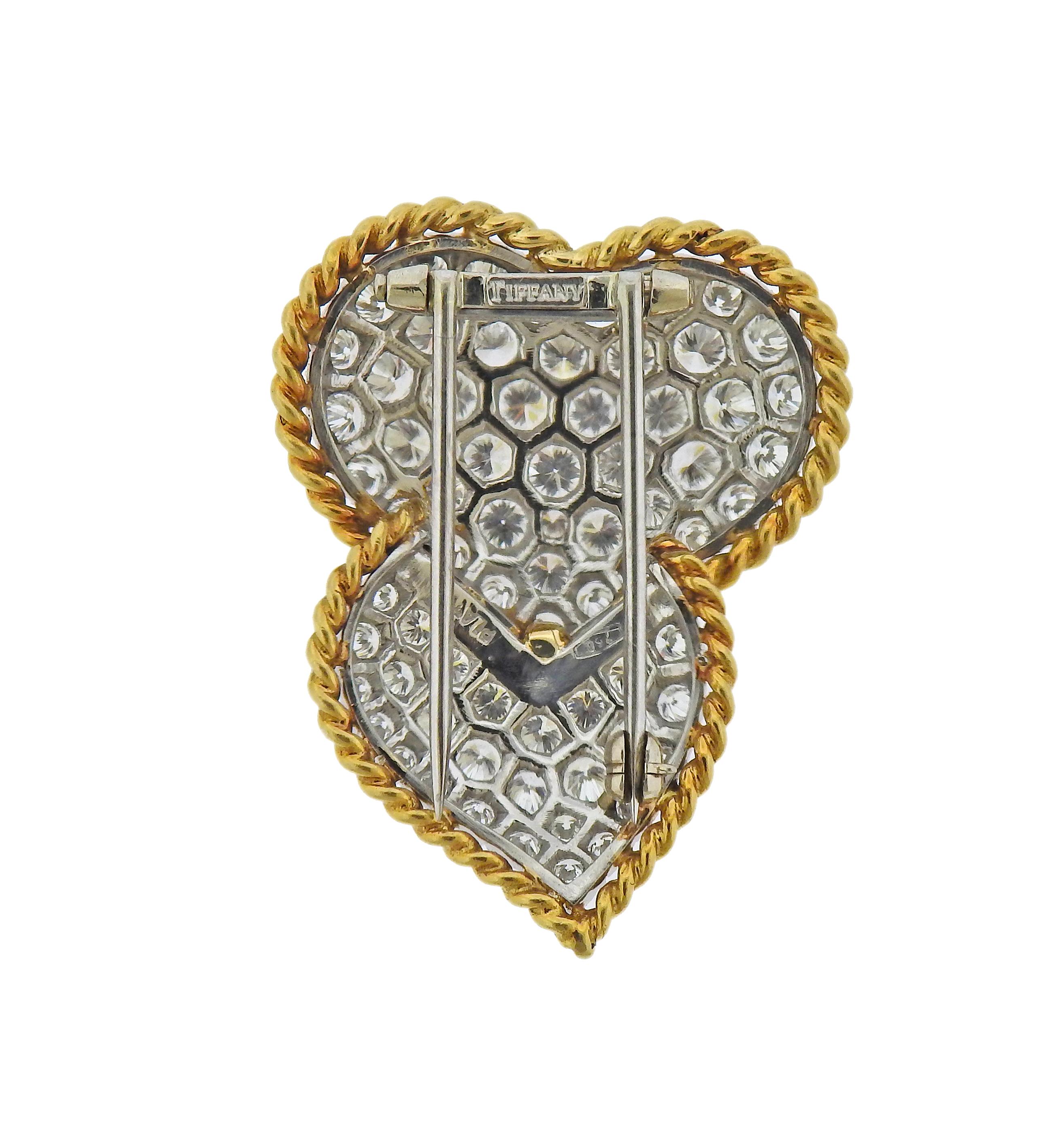 18k yellow gold and platinum brooch by Tiffany & Co, set with approx. 3.50ctw in diamonds. Brooch measures 34mm x 25mm. Marked: Tiffany, Plat, 750.  Weight - 10.1 grams. 