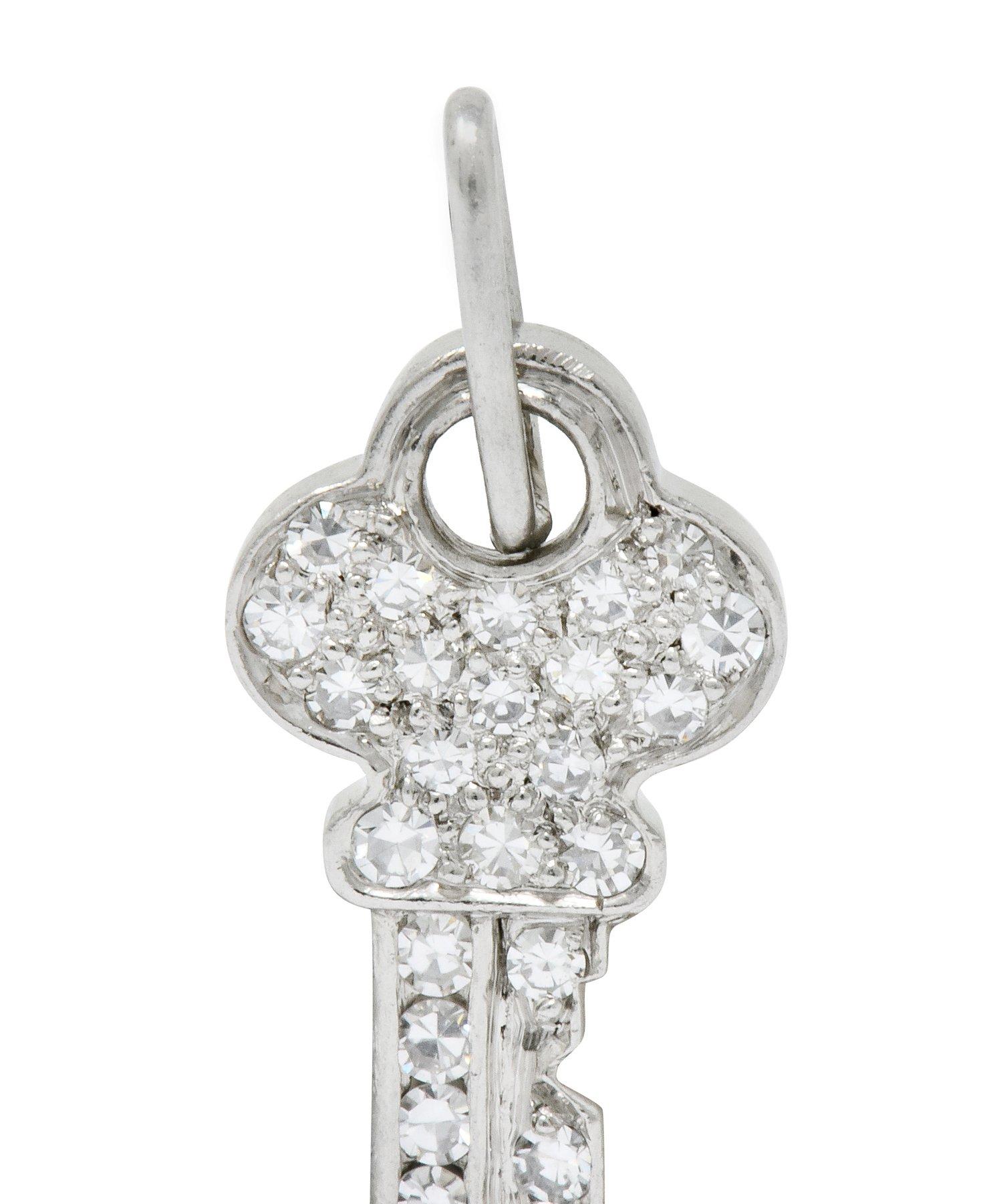 Charm is designed as a stylized key

Pavé set throughout by single cut diamonds weighing approximately 0.50 carat total, F/G color and VVS clarity

Completed by elongated jump ring bale

Fully signed Tiffany & Co.

Tested as platinum

Circa: