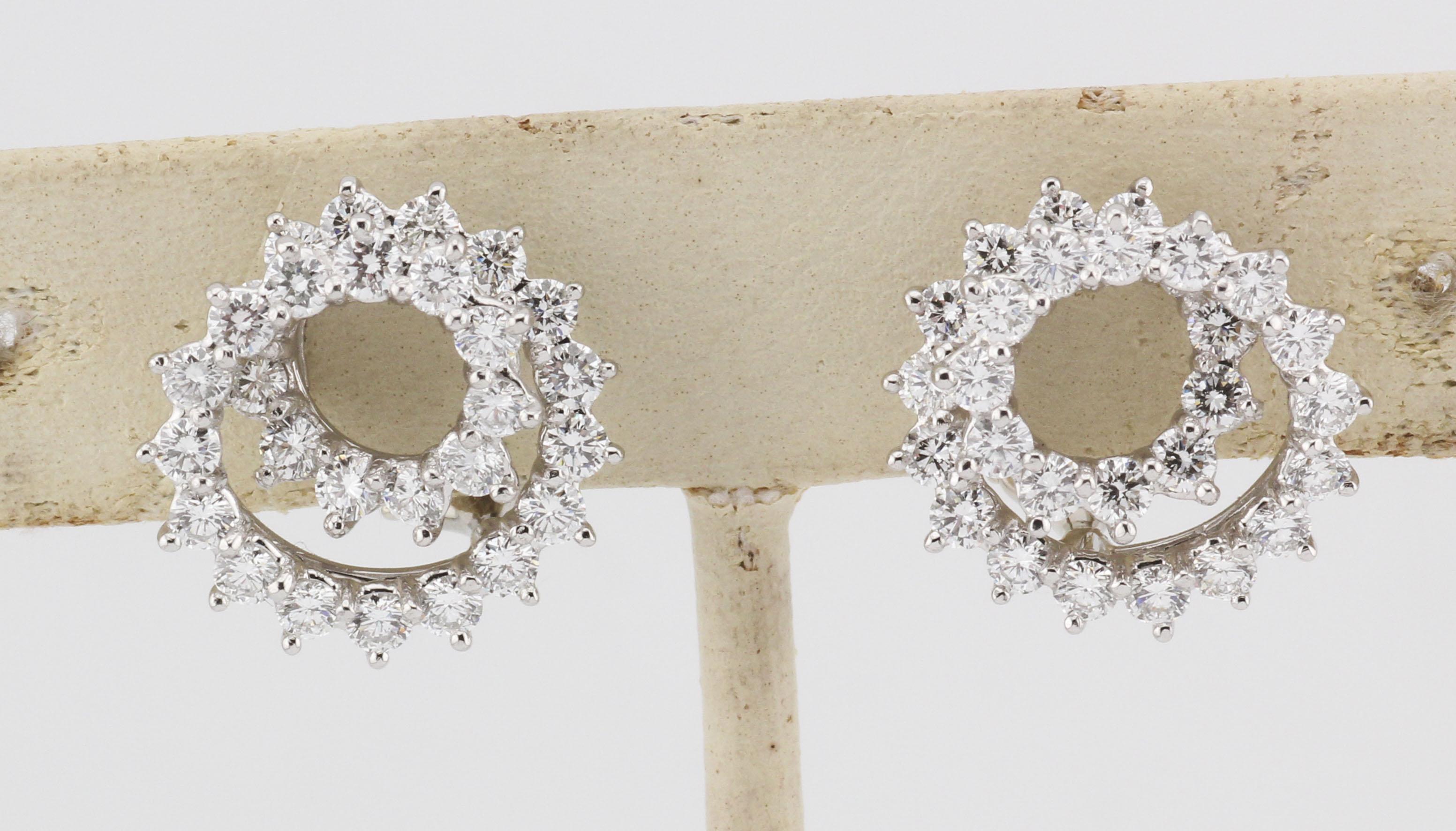 A masterful expression of timeless glamour, the Tiffany & Co. Diamond Platinum Swirl Earrings embody the house’s legacy of exquisite craftsmanship and refined elegance.

Sculpted in luminous platinum, each earring features a graceful swirl design